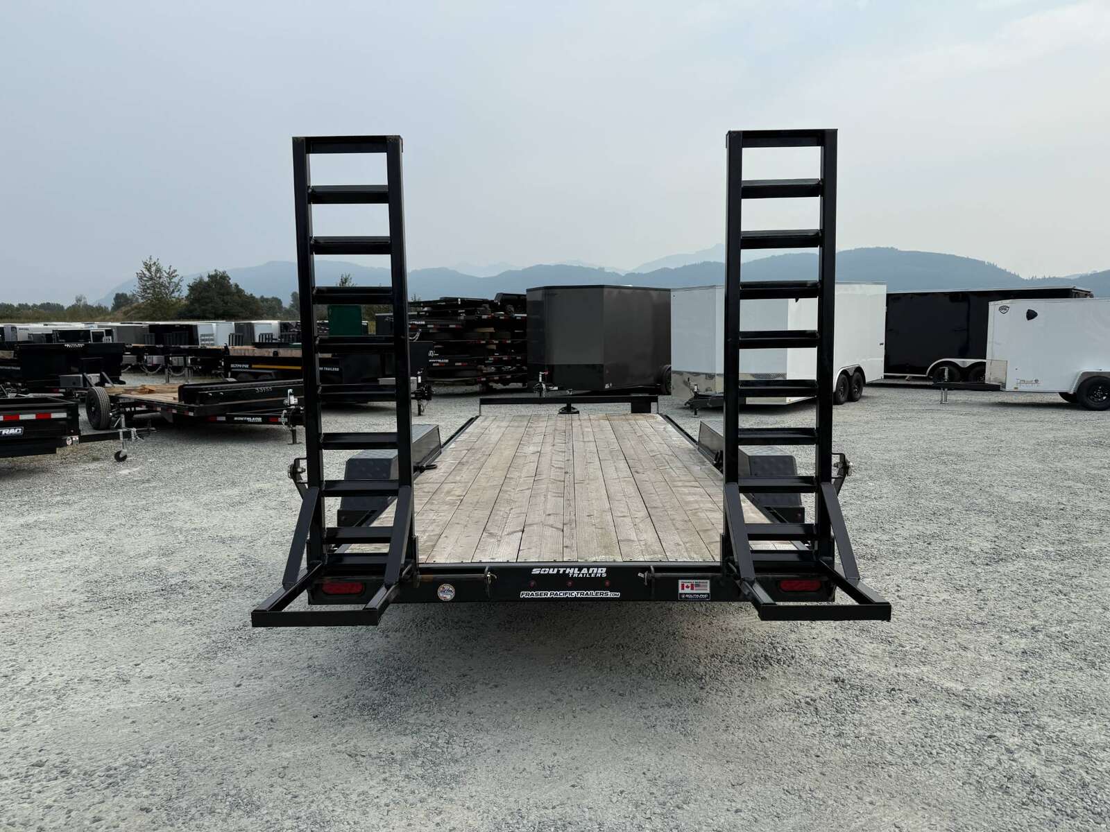 Photo of Used Pre Owned 2024 Southland 7X18 15,400LB GVW Equipment Flat Deck Trailer w/ Stand Up Ramps