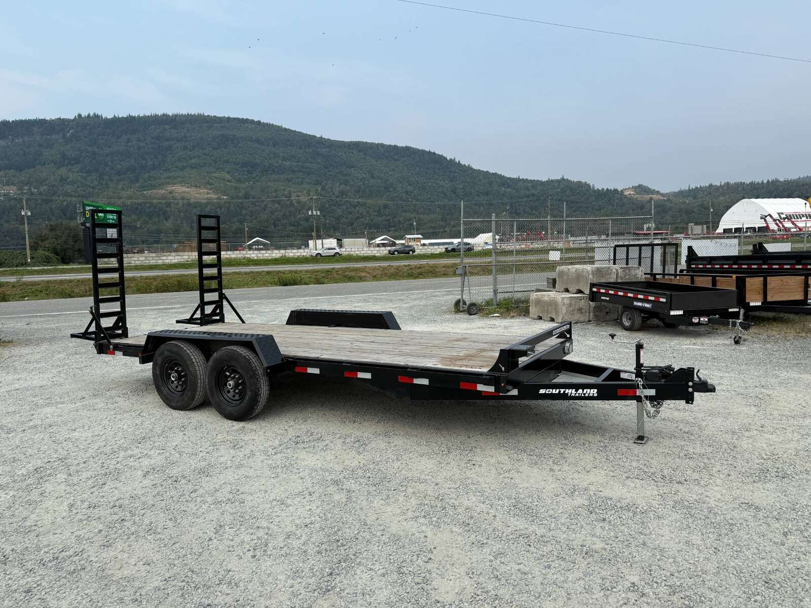 Photo of Used Pre Owned 2024 Southland 7X18 15,400LB GVW Equipment Flat Deck Trailer w/ Stand Up Ramps