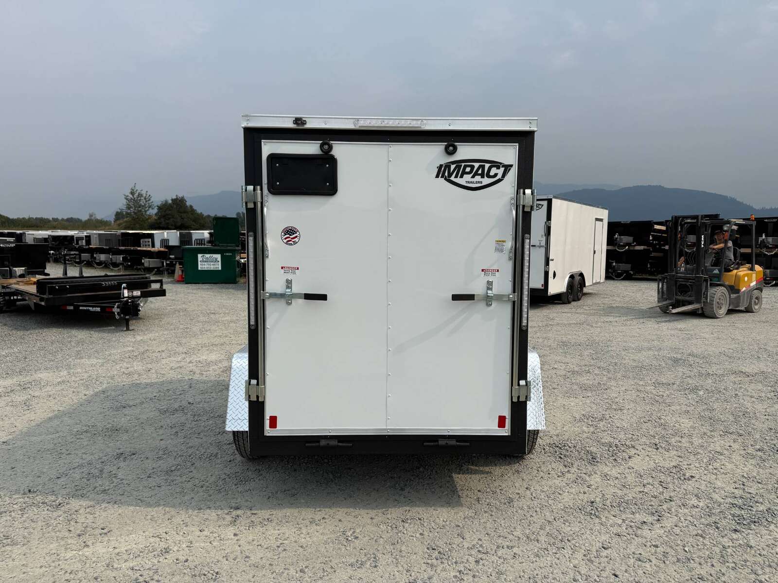 Photo of 2026 Impact 5x8 Quake V Nose Cargo Enclosed Trailer Ramp Door White 2990lb GVW