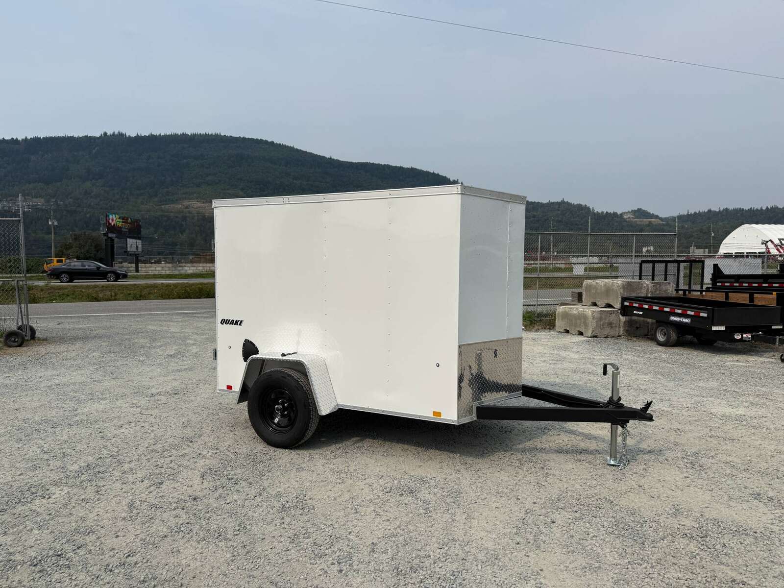 Photo of 2026 Impact 5x8 Quake V Nose Cargo Enclosed Trailer Ramp Door White 2990lb GVW
