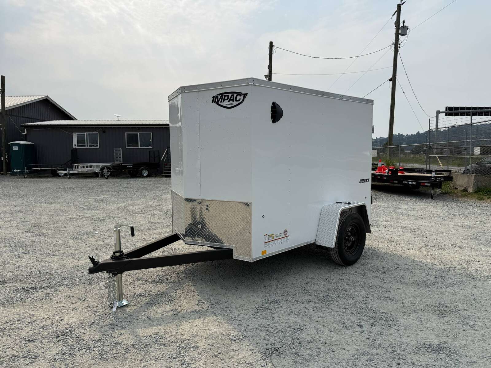 Photo of 2026 Impact 5x8 Quake V Nose Cargo Enclosed Trailer Ramp Door White 2990lb GVW