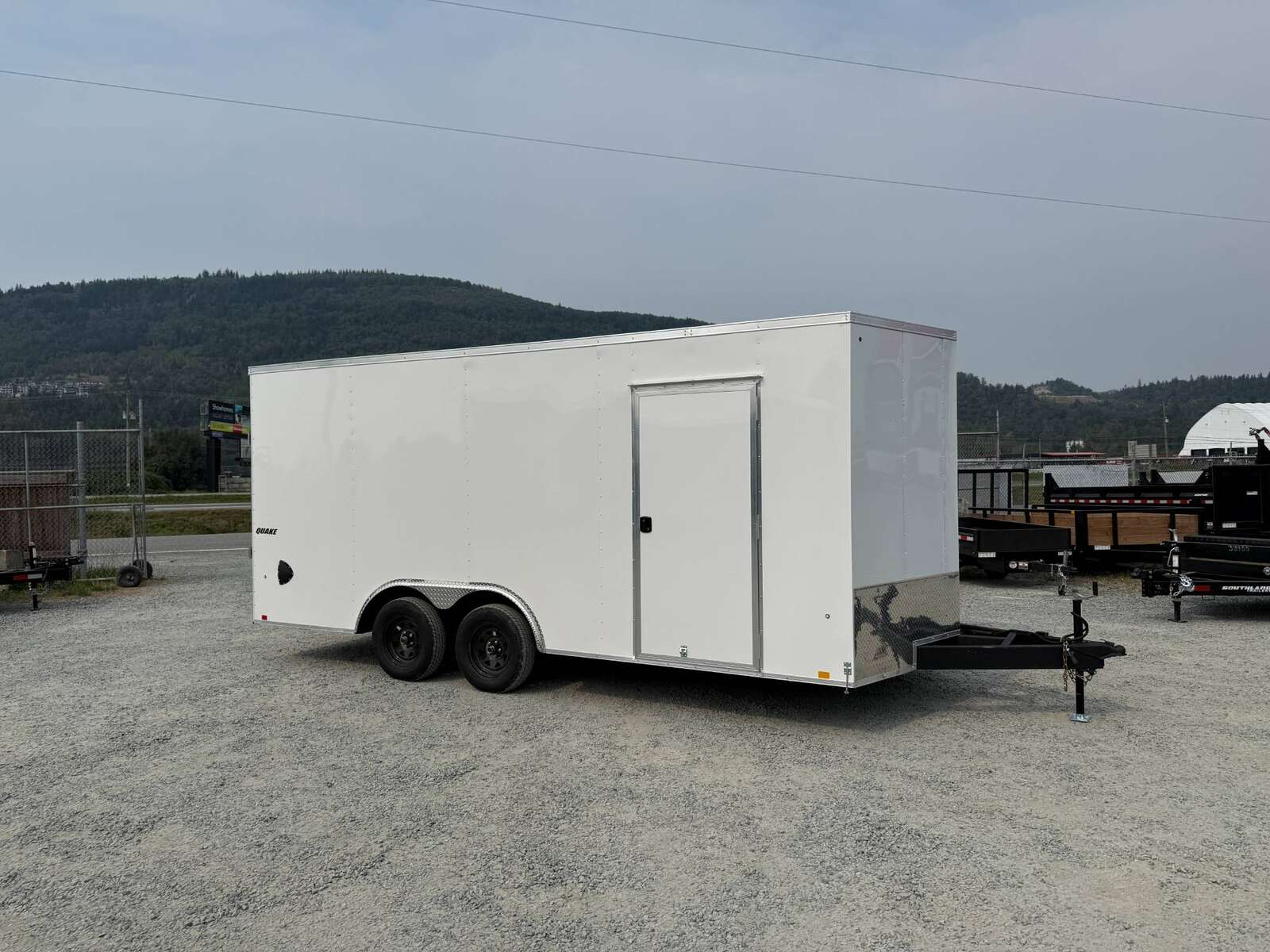 Photo of 2025 Impact 8.5x18 Quake V Nose Cargo Enclosed Trailer Ramp Door Extra Height White 7000lb GVW