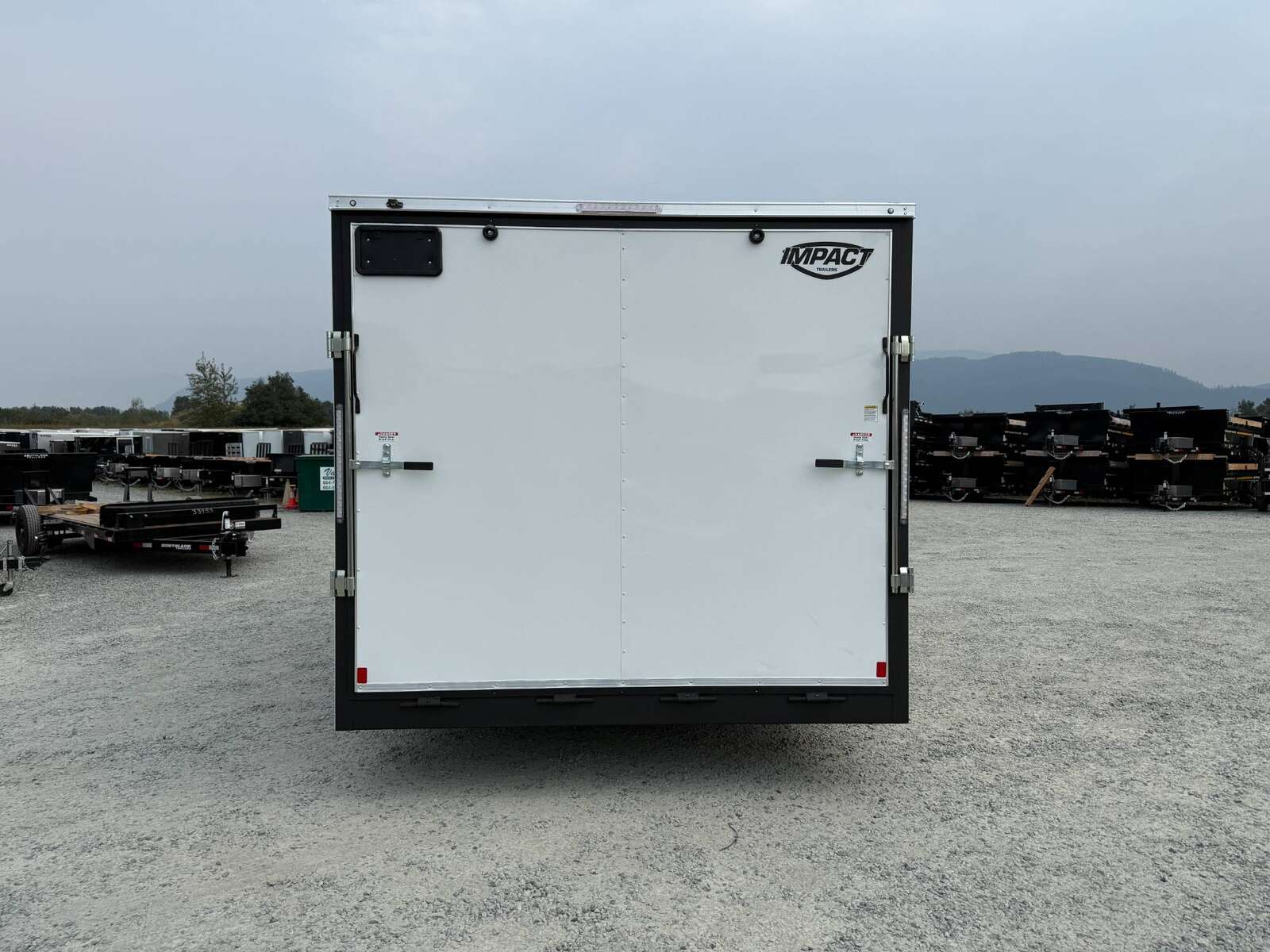 Photo of 2025 Impact 8.5x18 Quake V Nose Cargo Enclosed Trailer Ramp Door Extra Height White 7000lb GVW
