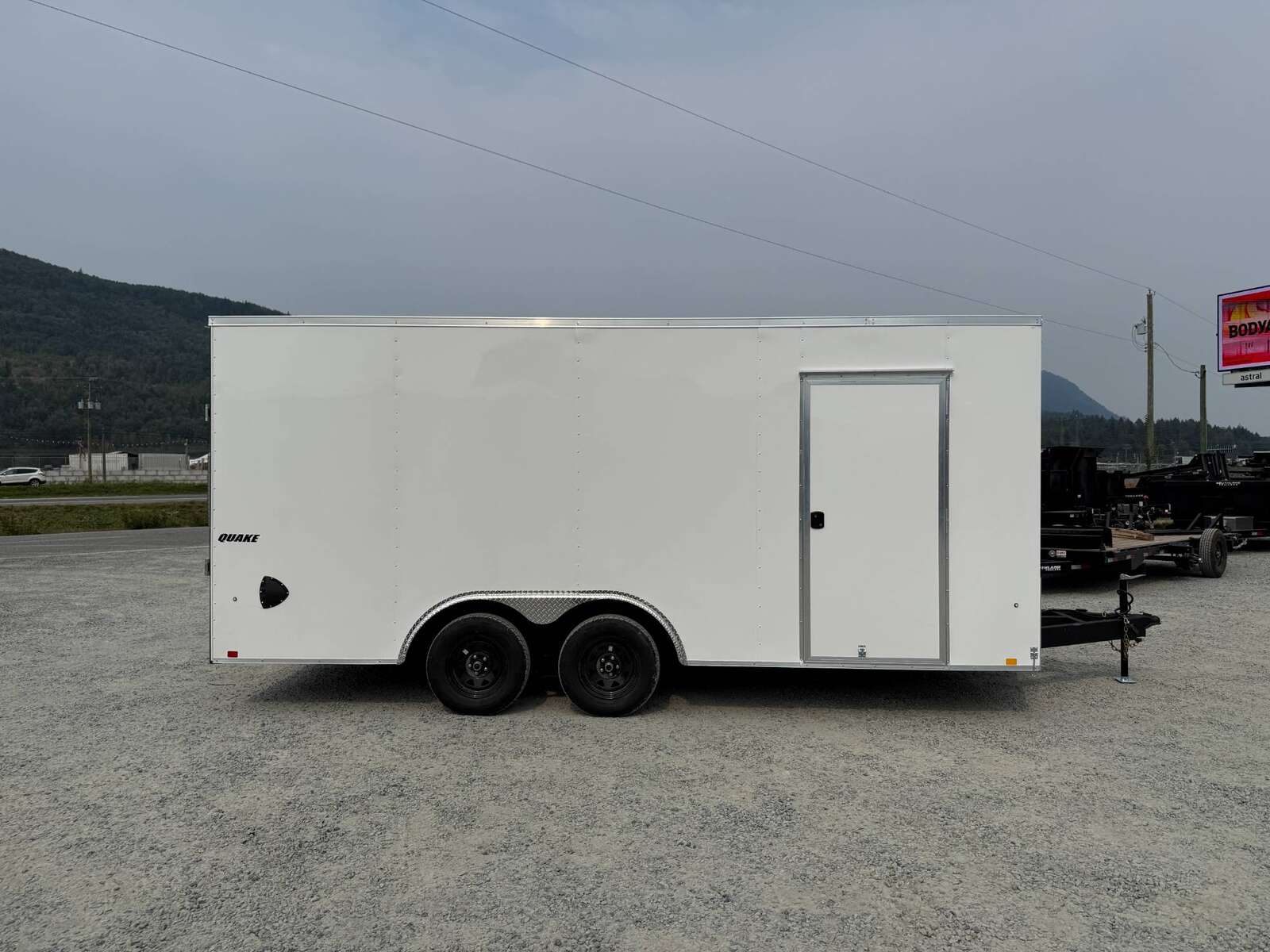 Photo of 2025 Impact 8.5x18 Quake V Nose Cargo Enclosed Trailer Ramp Door Extra Height White 7000lb GVW