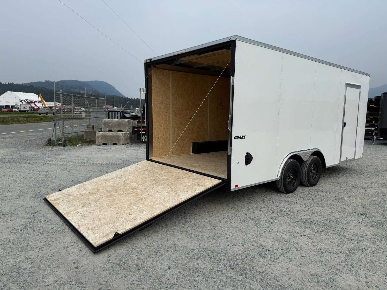 Photo of 2025 Impact 8.5x18 Quake V Nose Cargo Enclosed Trailer Ramp Door Extra Height White 7000lb GVW