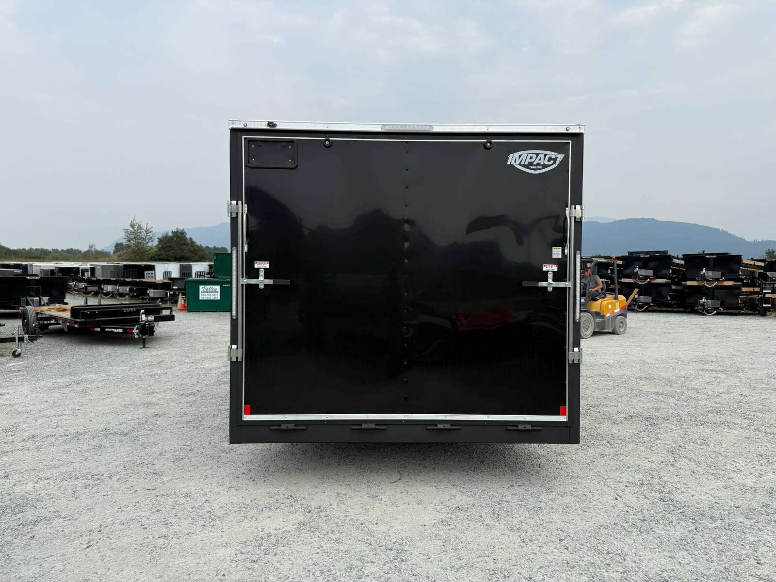 Photo of 2025 Impact 8.5x18 Quake V Nose Cargo Enclosed Trailer Ramp Door Extra Height Black 7000lb GVW