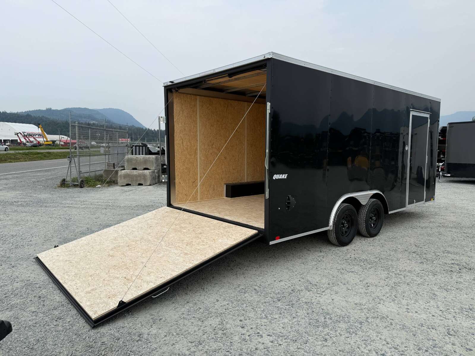 Photo of 2025 Impact 8.5x18 Quake V Nose Cargo Enclosed Trailer Ramp Door Extra Height Black 7000lb GVW