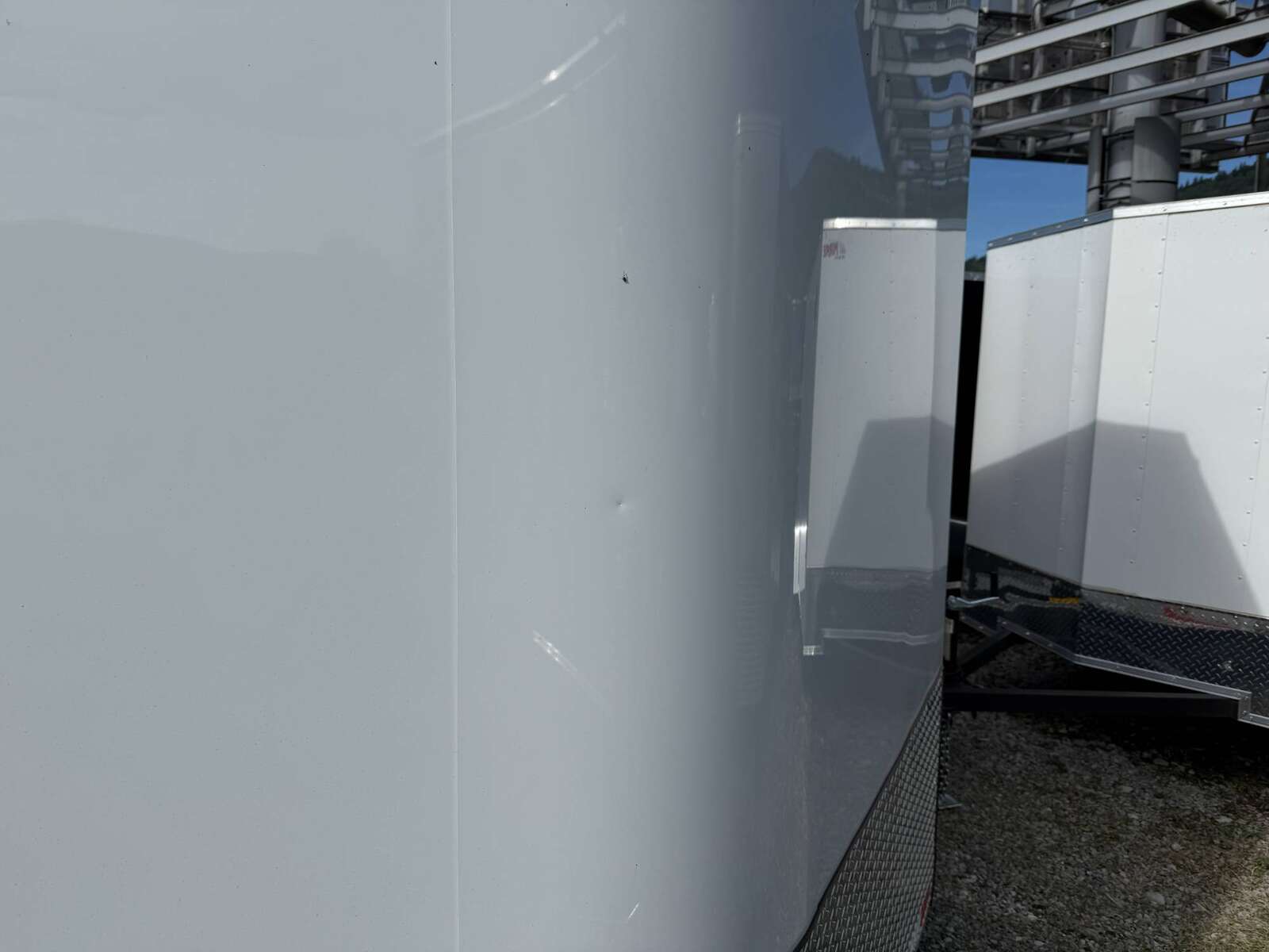 Photo of **DENT SALE** 2026 Royal Cargo 8.5x24 V Nose Car Hauler Cargo / Enclosed Trailer 11,400lb GVW White Ramp Door Extra Height