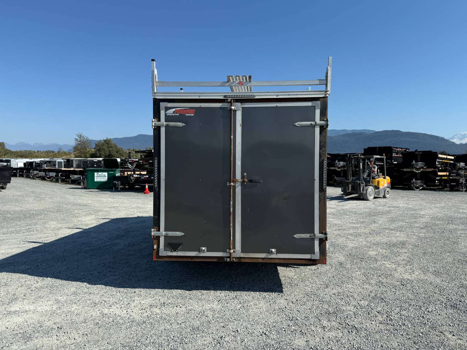 Photo of Used Pre Owned Mirage 7x16 Xpres Cargo / Enclosed Trailer 7000lb GVW Charcoal Grey Barn Doors