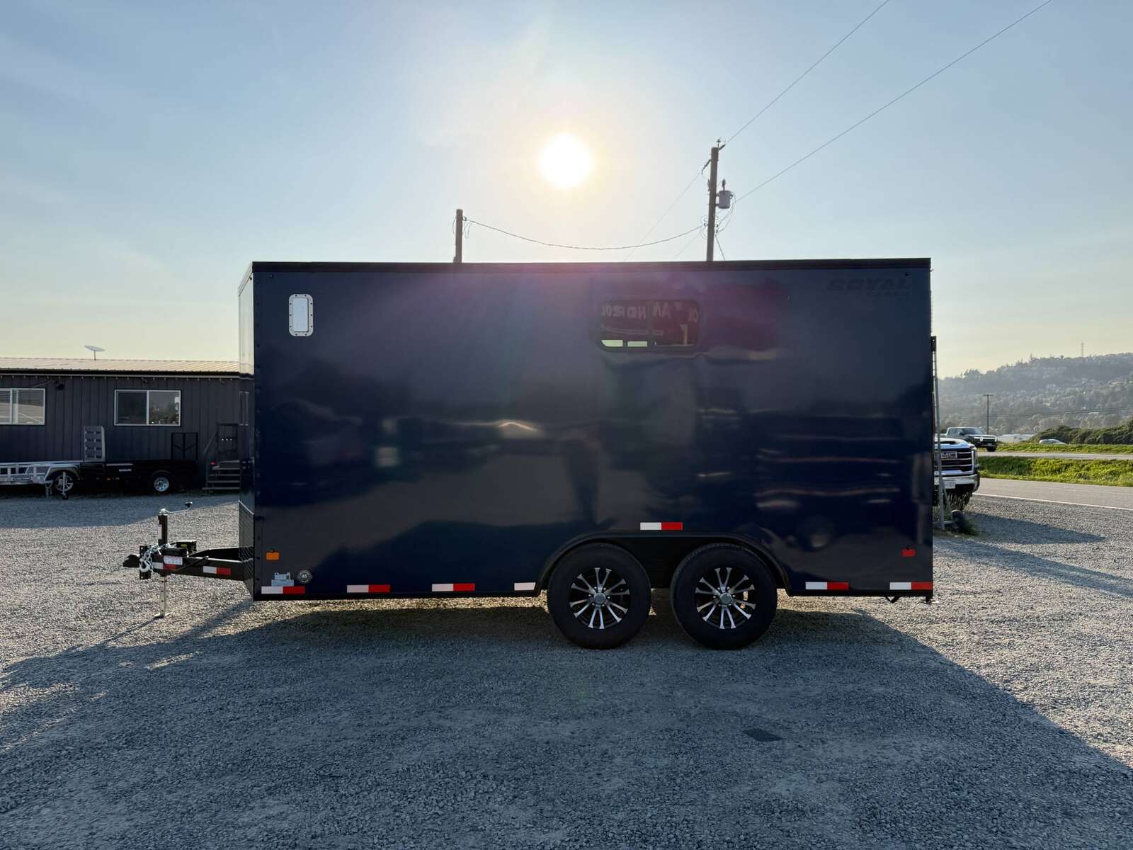 Photo of 2026 Royal 8.5x16 V Nose Cargo Enclosed Trailer Camping Package Blue w/ Blackout Pkg, Insulated, Ramp Door, White Walls, 2x Windows & More!