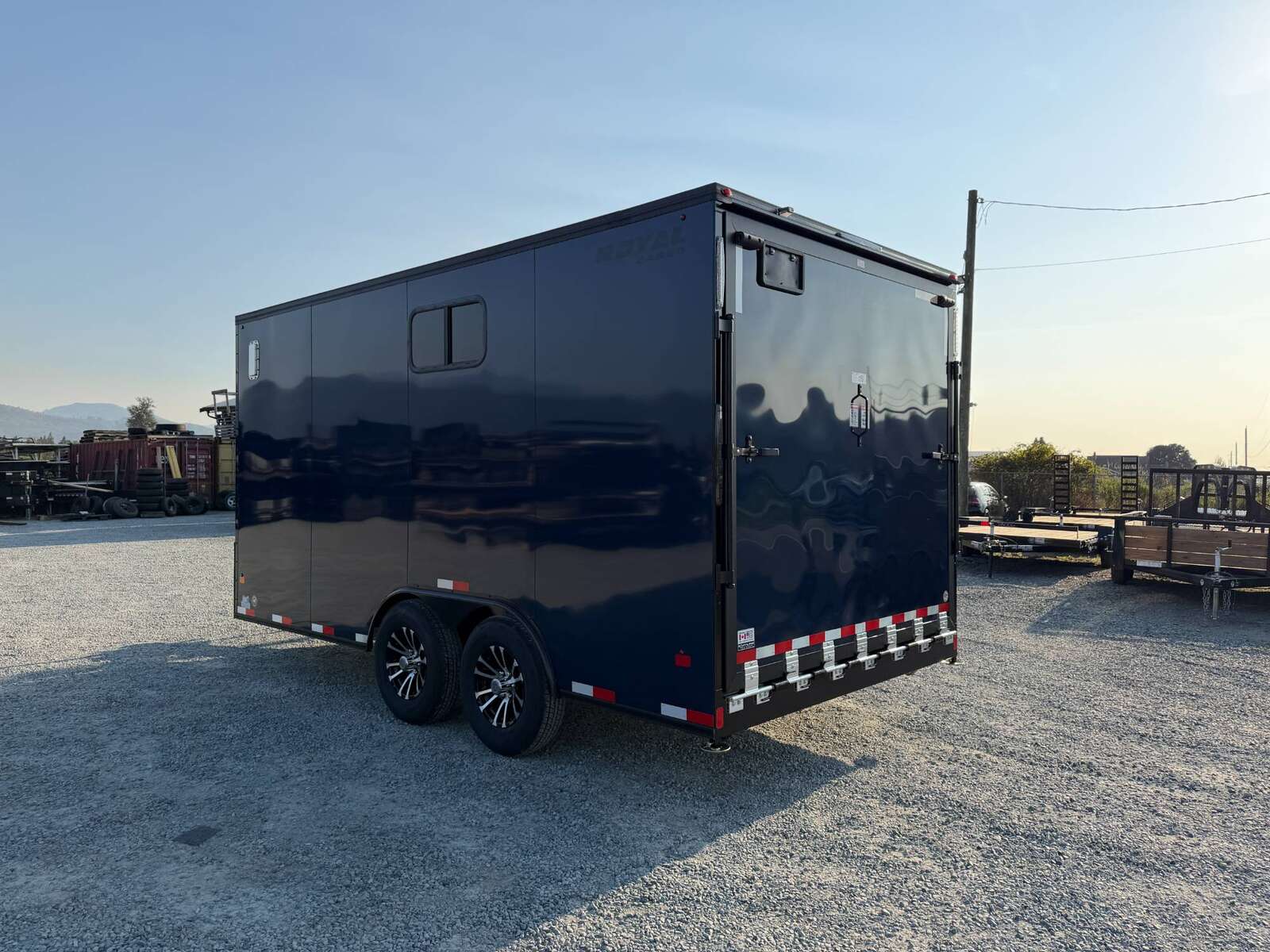 Photo of 2026 Royal 8.5x16 V Nose Cargo Enclosed Trailer Camping Package Blue w/ Blackout Pkg, Insulated, Ramp Door, White Walls, 2x Windows & More!