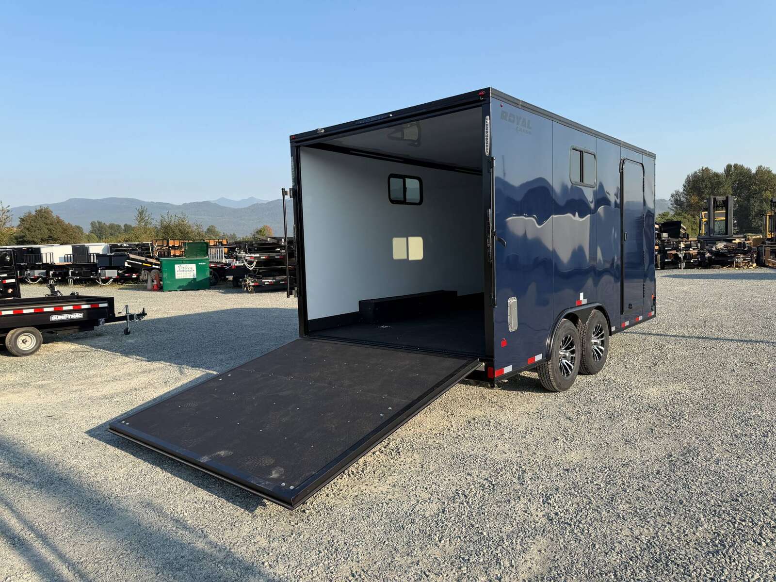 Photo of 2026 Royal 8.5x16 V Nose Cargo Enclosed Trailer Camping Package Blue w/ Blackout Pkg, Insulated, Ramp Door, White Walls, 2x Windows & More!