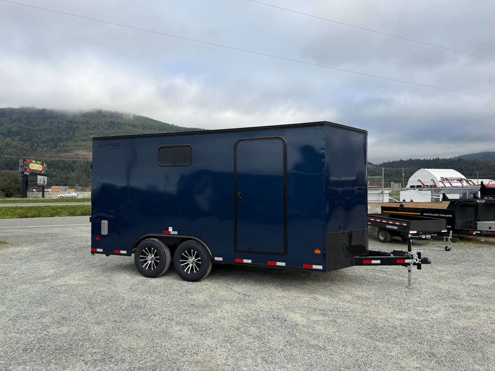 Photo of 2026 Royal 8.5x16 V Nose Cargo Enclosed Trailer Camping Package Blue w/ Blackout Pkg, Insulated, Ramp Door, White Walls, 2x Windows & More!