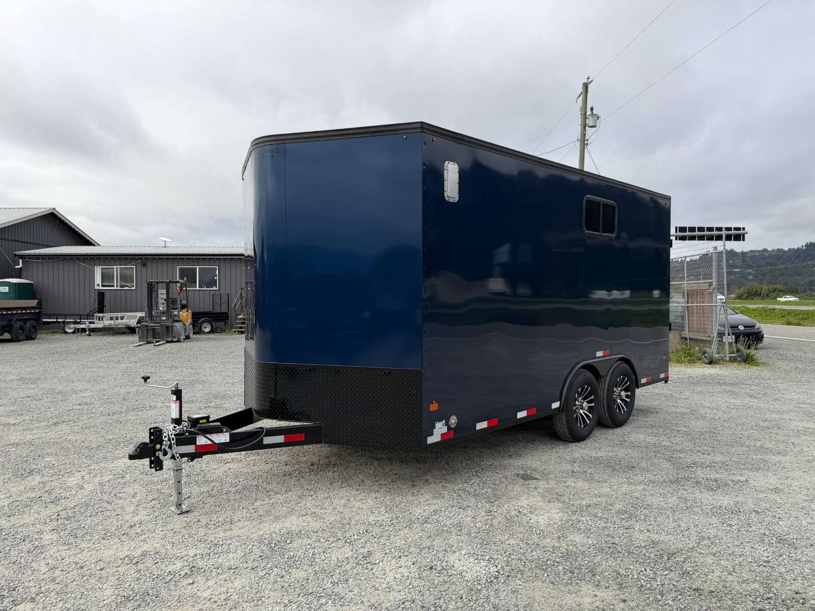 Photo of 2026 Royal 8.5x16 V Nose Cargo Enclosed Trailer Camping Package Blue w/ Blackout Pkg, Insulated, Ramp Door, White Walls, 2x Windows & More!