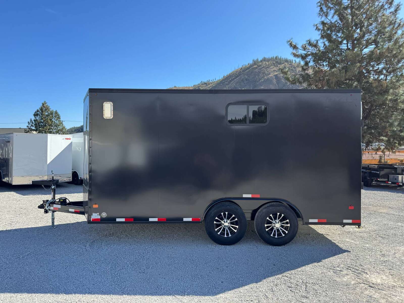 Photo of 2026 Royal 8.5x16 V Nose Cargo Enclosed Trailer Camping Package Black w/ Blackout Pkg, Insulated, Ramp Door, White Walls, 2x Windows & More!