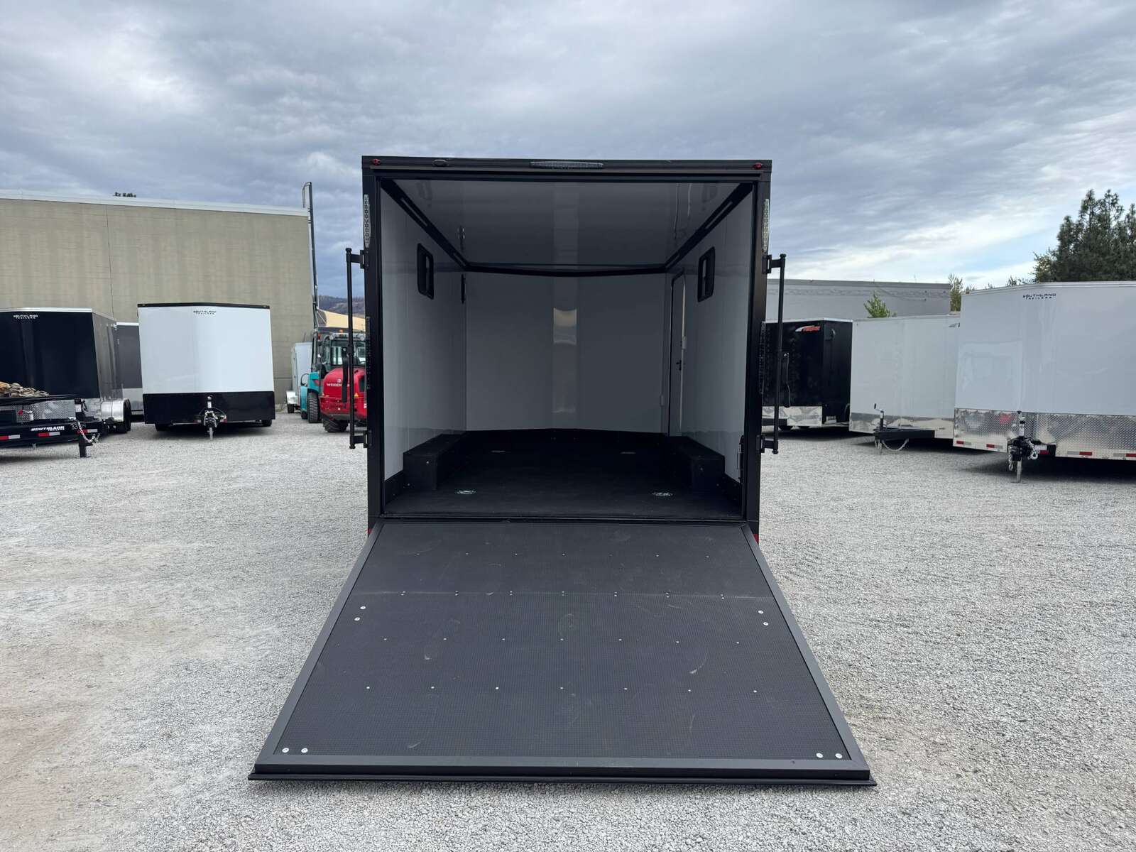 Photo of 2026 Royal 8.5x16 V Nose Cargo Enclosed Trailer Camping Package Charcoal Grey w/ Blackout Pkg, Insulated, Ramp Door, White Walls, 2x Windows & More!
