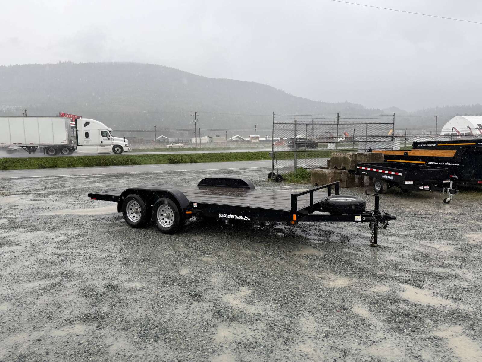 Photo of Pre Owned Used 2018 Snake River 7x16 Flat Deck Car Hauler Trailer 7000lb GVW w/ Ramps