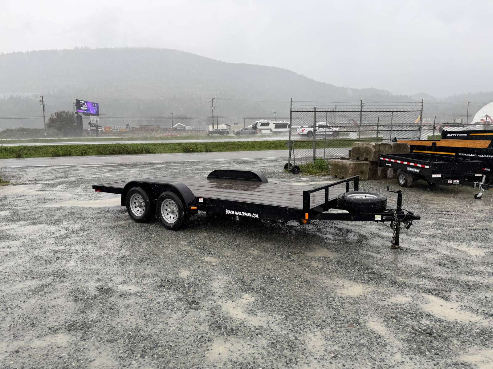 Photo of Pre Owned Used 2018 Snake River 7x16 Flat Deck Car Hauler Trailer 7000lb GVW w/ Ramps