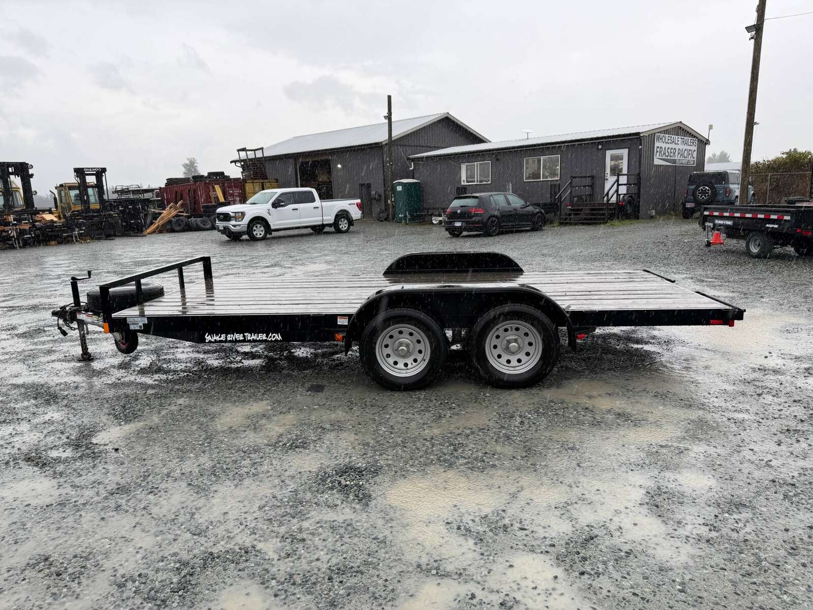 Photo of Pre Owned Used 2018 Snake River 7x16 Flat Deck Car Hauler Trailer 7000lb GVW w/ Ramps
