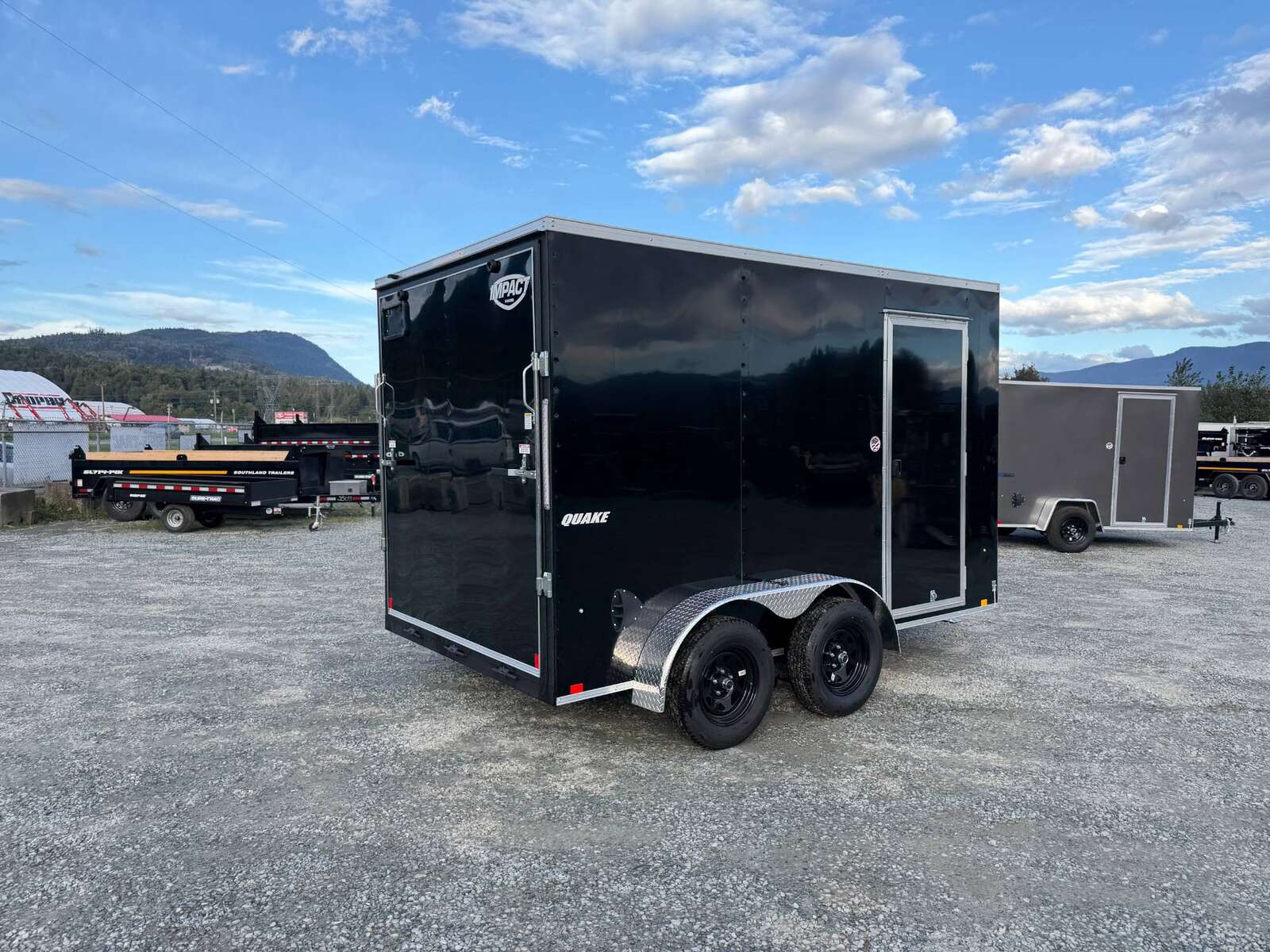 Photo of 2026 Impact Quake 7x12 Cargo Enclosed Trailer Tandem Axle 7000lb GVW Black Extra Height w/ Ramp Door