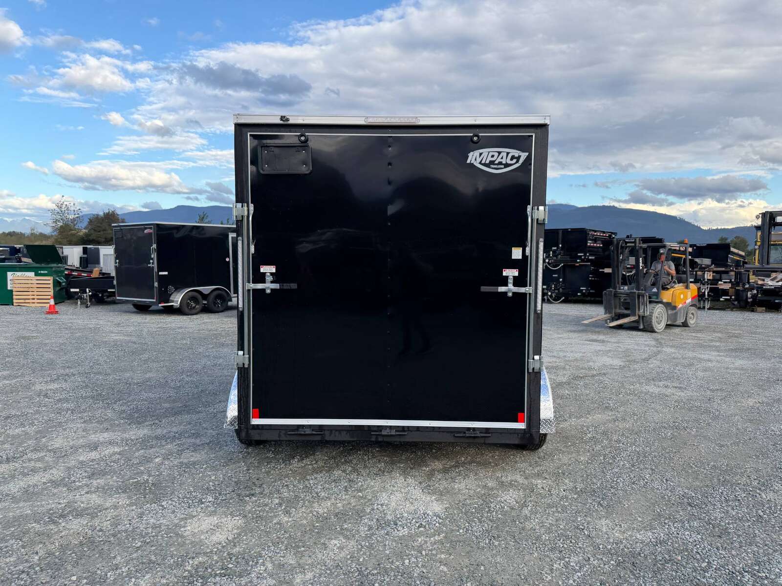 Photo of 2026 Impact Quake 7x12 Cargo Enclosed Trailer Tandem Axle 7000lb GVW Black Extra Height w/ Ramp Door