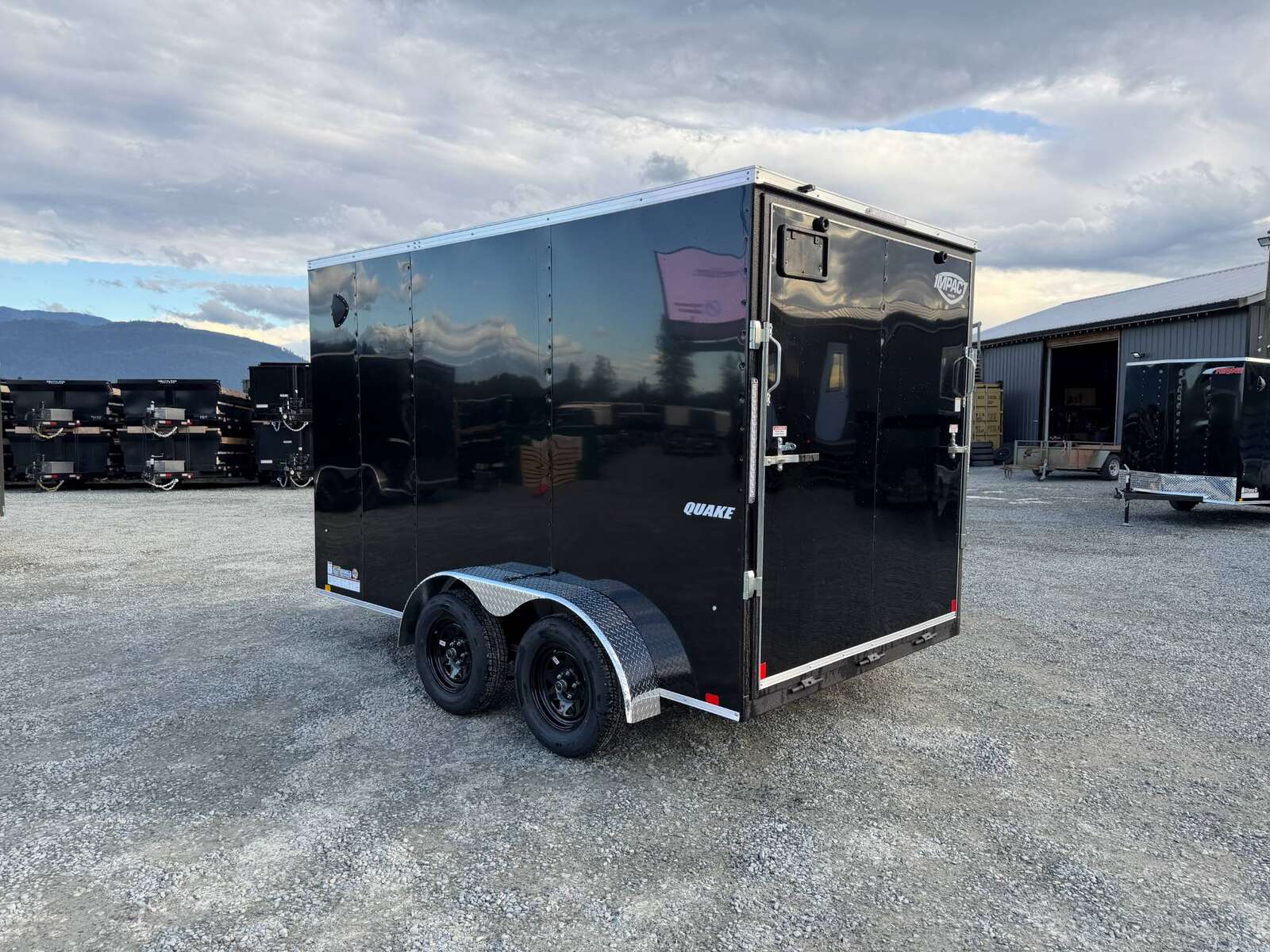 Photo of 2026 Impact Quake 7x12 Cargo Enclosed Trailer Tandem Axle 7000lb GVW Black Extra Height w/ Ramp Door