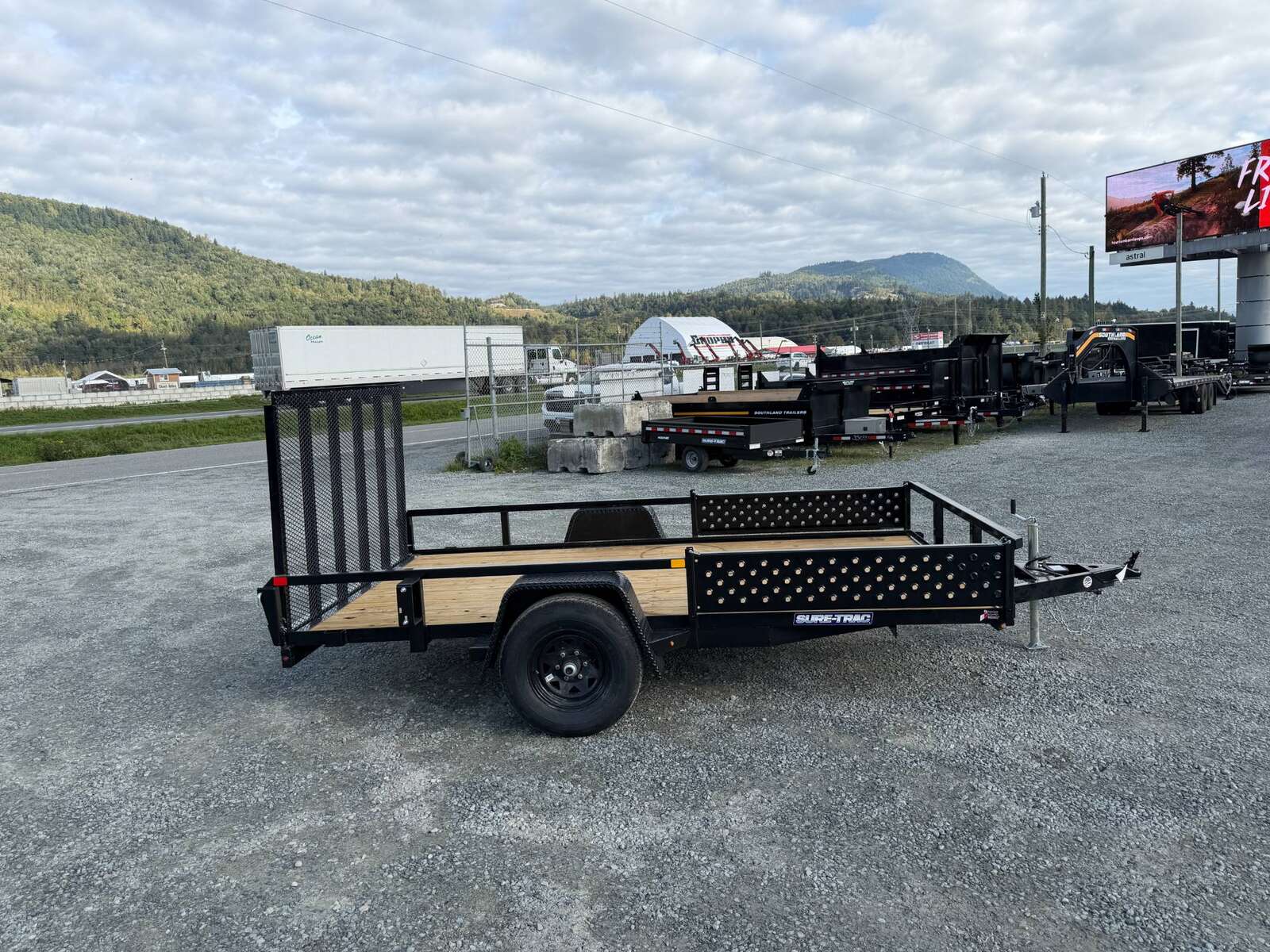 Photo of 2026 Suretrac 7x12 ATV Tube Top Utility Trailer 5000lb GVW w/ Electric Brakes & Rear Ramp Gate & Side Load Ramps