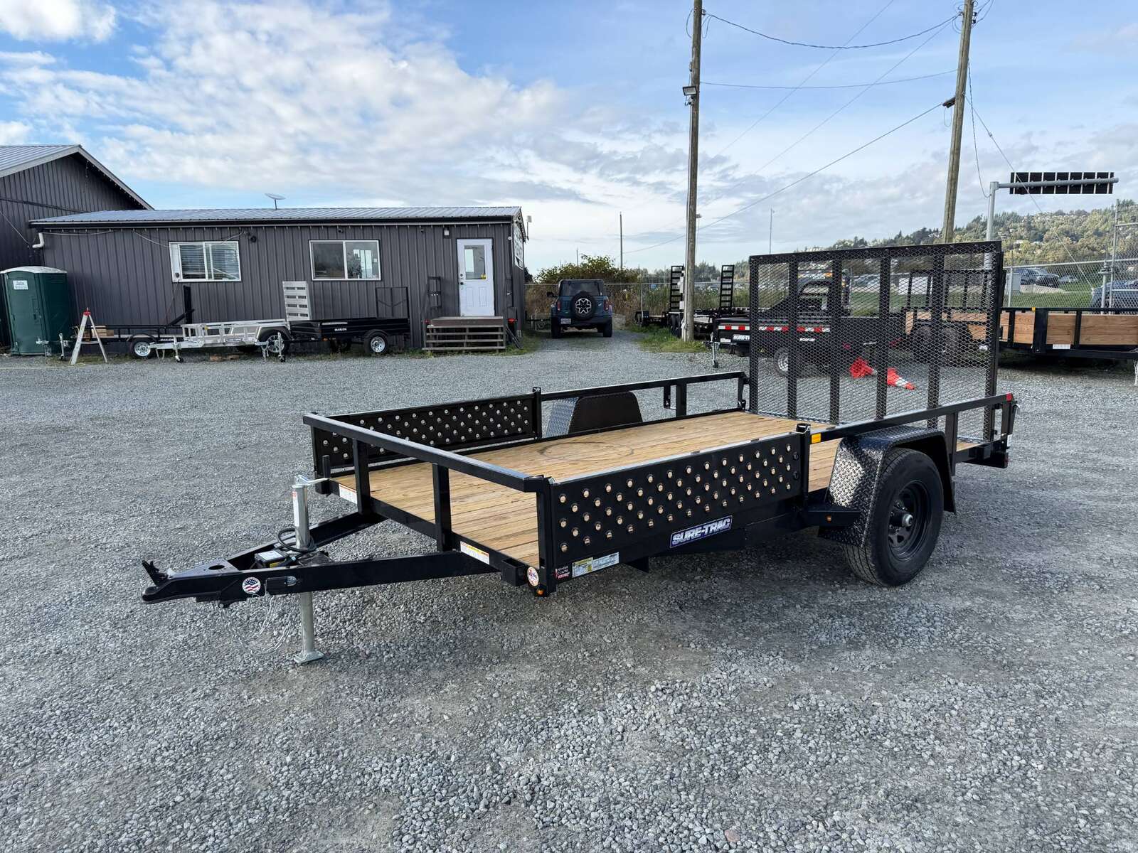 Photo of 2026 Suretrac 7x12 ATV Tube Top Utility Trailer 5000lb GVW w/ Electric Brakes & Rear Ramp Gate & Side Load Ramps