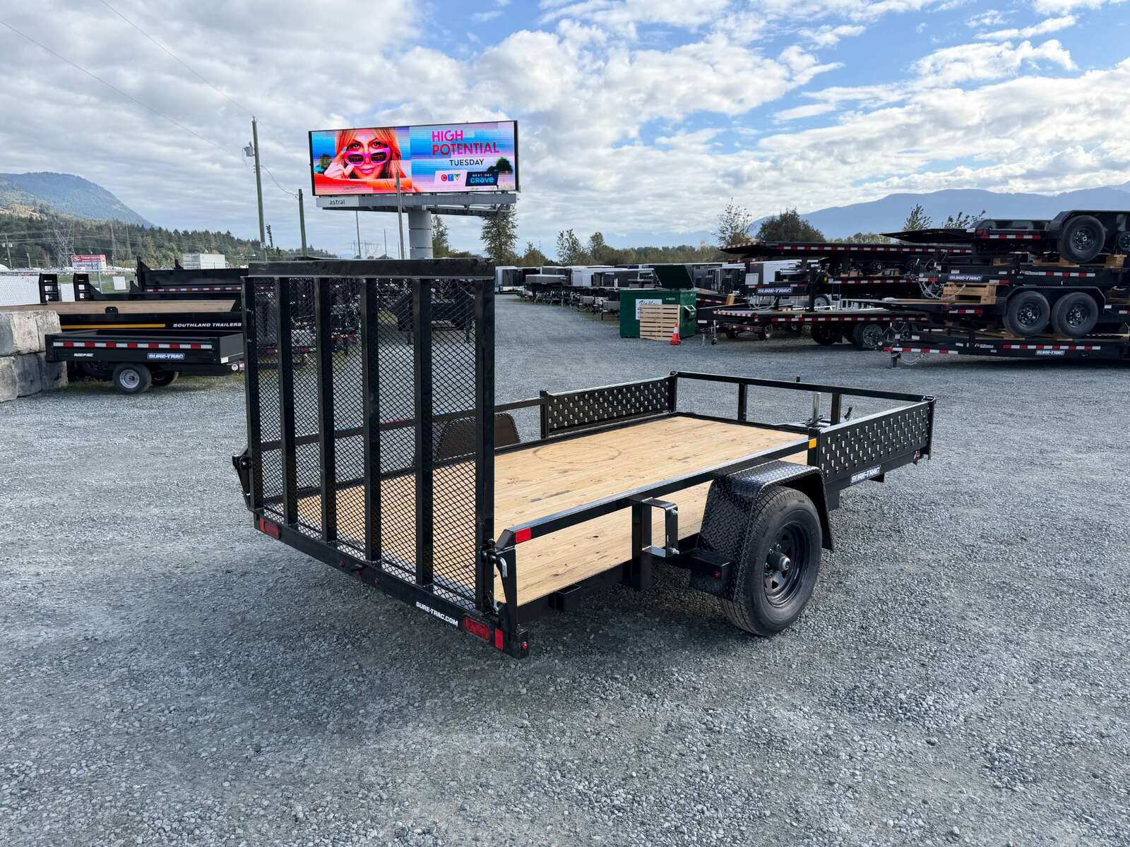 Photo of 2026 Suretrac 7x12 ATV Tube Top Utility Trailer 5000lb GVW w/ Electric Brakes & Rear Ramp Gate & Side Load Ramps