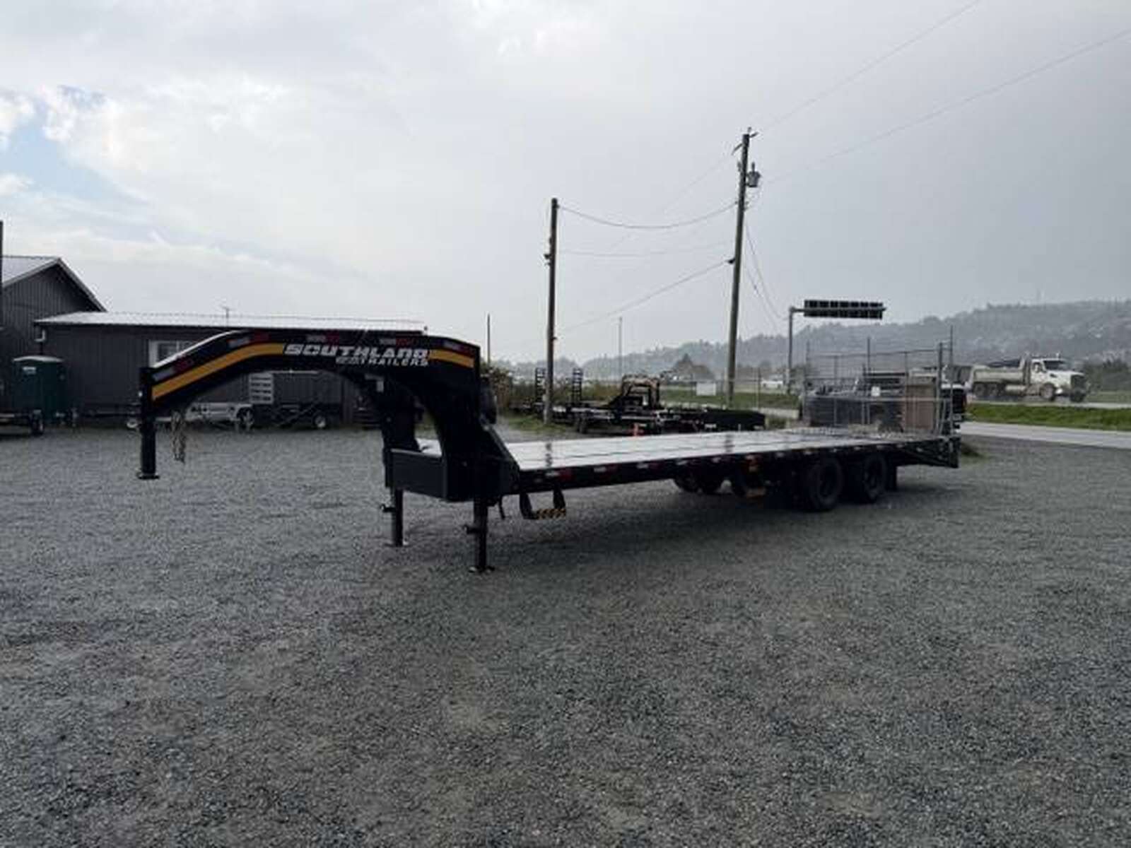 Photo of Pre Owned Used 2024 Southland 24+6 Gooseneck Flat Deck Equipment Trailer 29000lb GVW w/ Ramps 