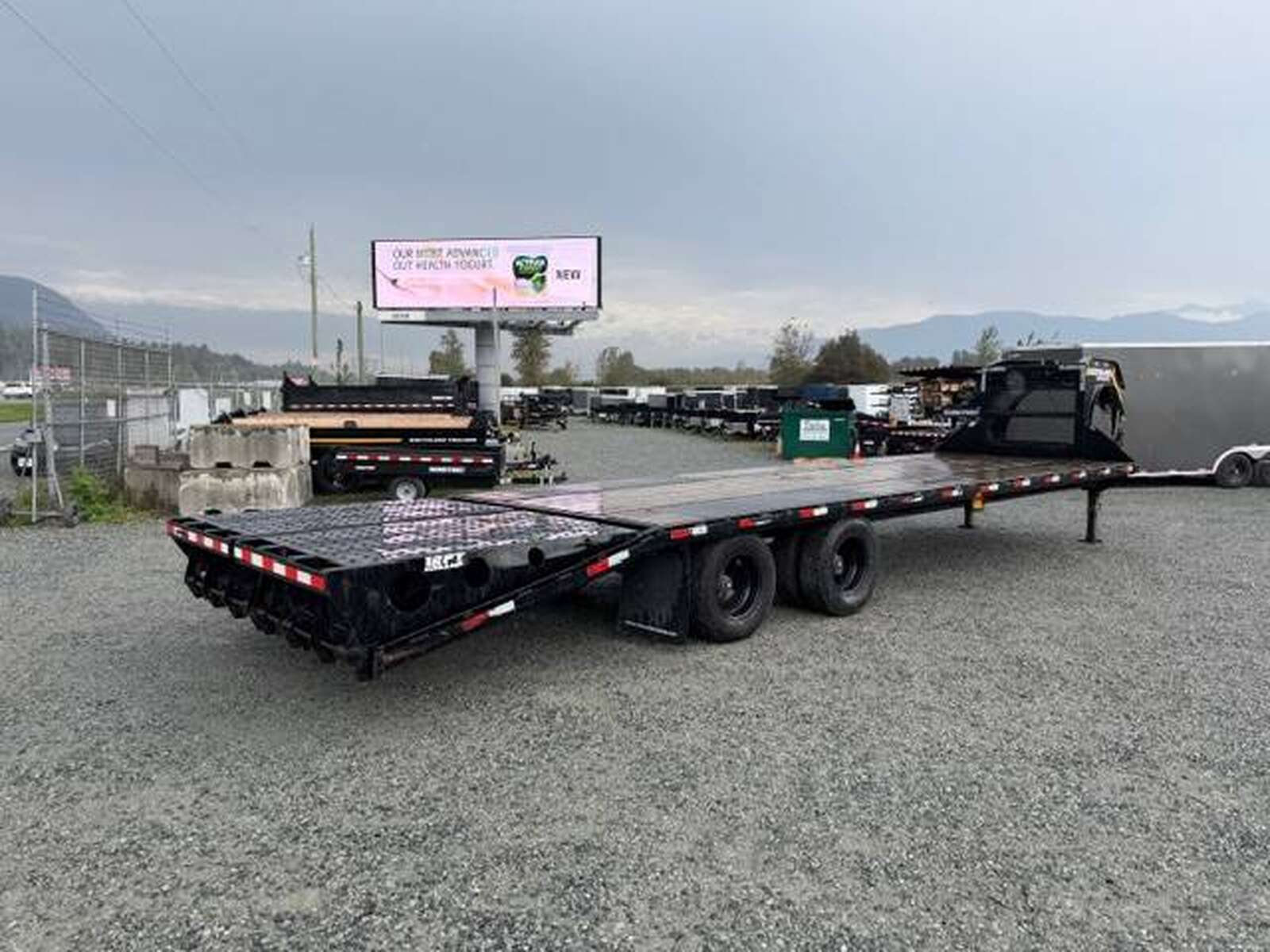 Photo of Pre Owned Used 2024 Southland 24+6 Gooseneck Flat Deck Equipment Trailer 29000lb GVW w/ Ramps 