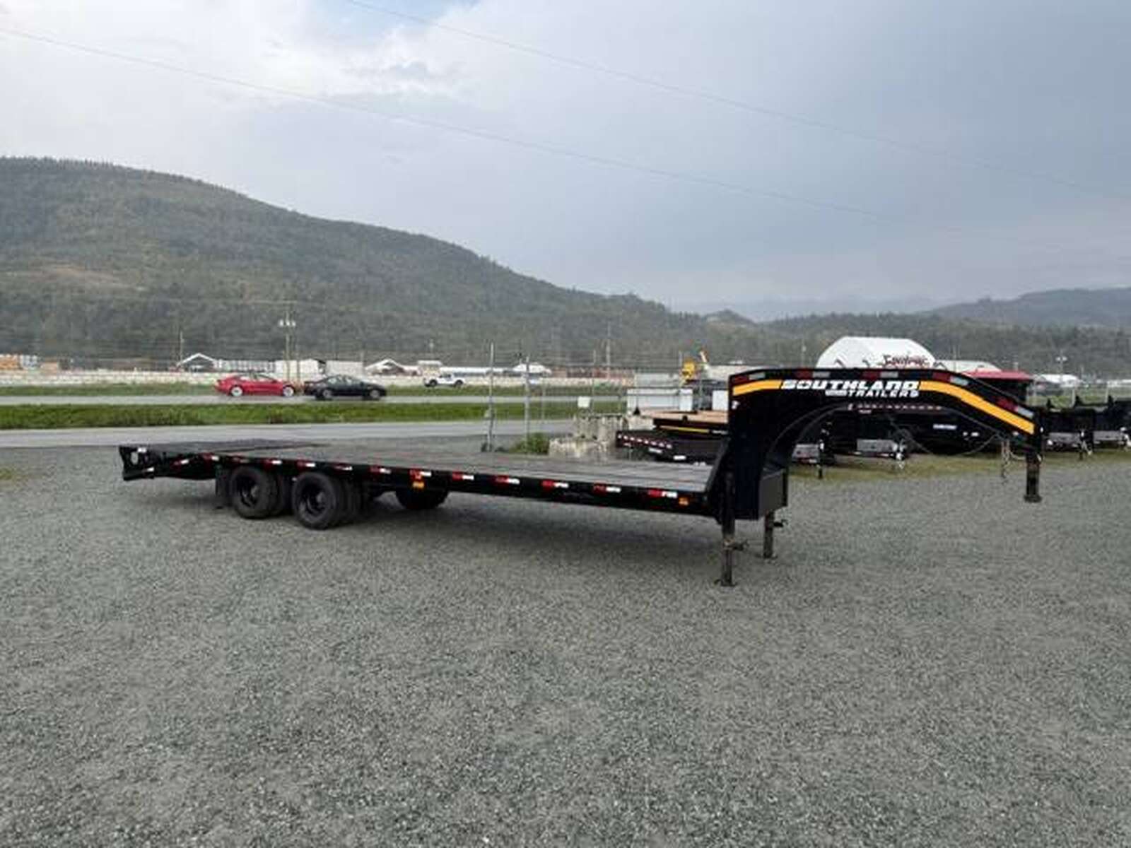 Photo of Pre Owned Used 2024 Southland 24+6 Gooseneck Flat Deck Equipment Trailer 29000lb GVW w/ Ramps 