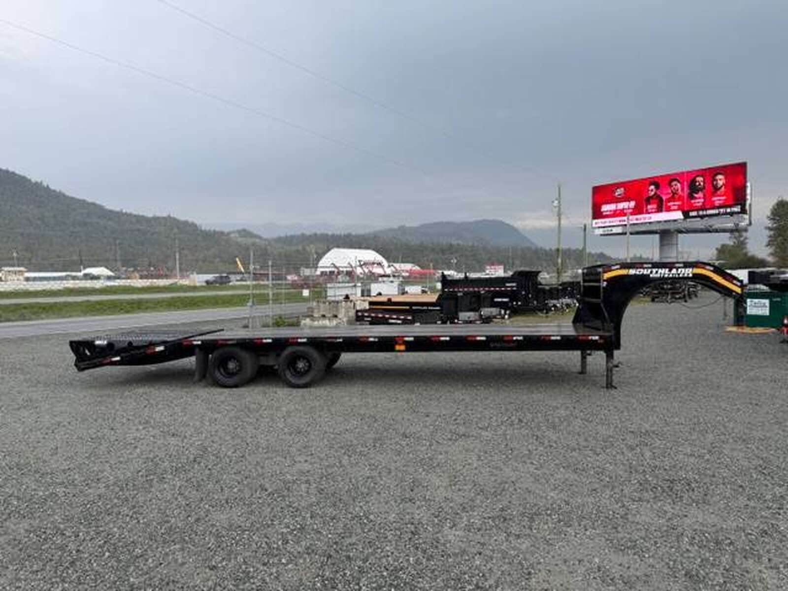 Photo of Pre Owned Used 2024 Southland 24+6 Gooseneck Flat Deck Equipment Trailer 29000lb GVW w/ Ramps 