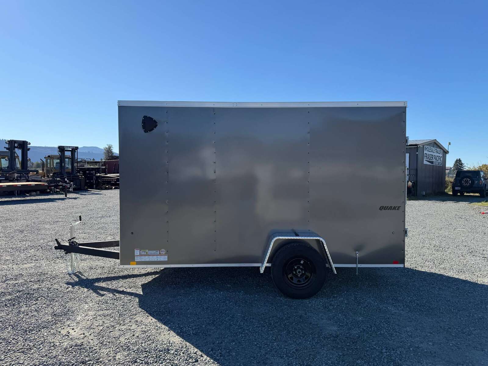 Photo of 2026 Impact Quake 6x12 V Nose Cargo / Enclosed Trailer Charcoal Grey Barn Doors Extra Height 2990lb GVW