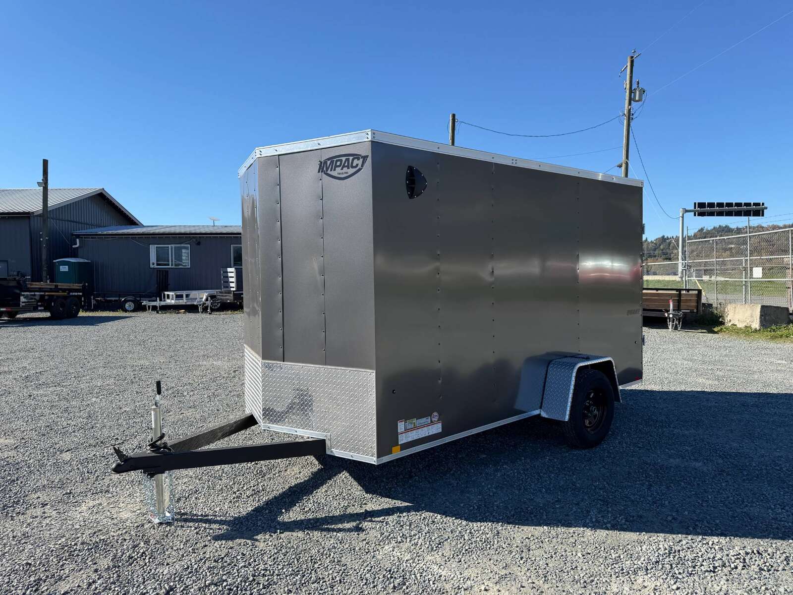 Photo of 2026 Impact Quake 6x12 V Nose Cargo / Enclosed Trailer Charcoal Grey Barn Doors Extra Height 2990lb GVW