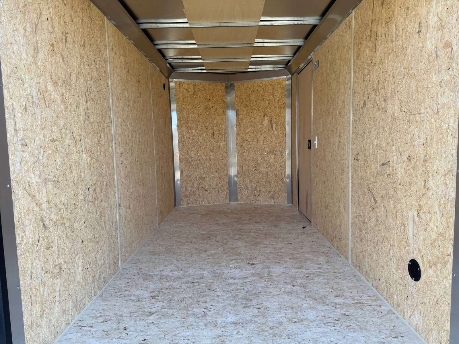 Photo of 2026 Impact Quake 6x12 V Nose Cargo / Enclosed Trailer Charcoal Grey Barn Doors Extra Height 2990lb GVW