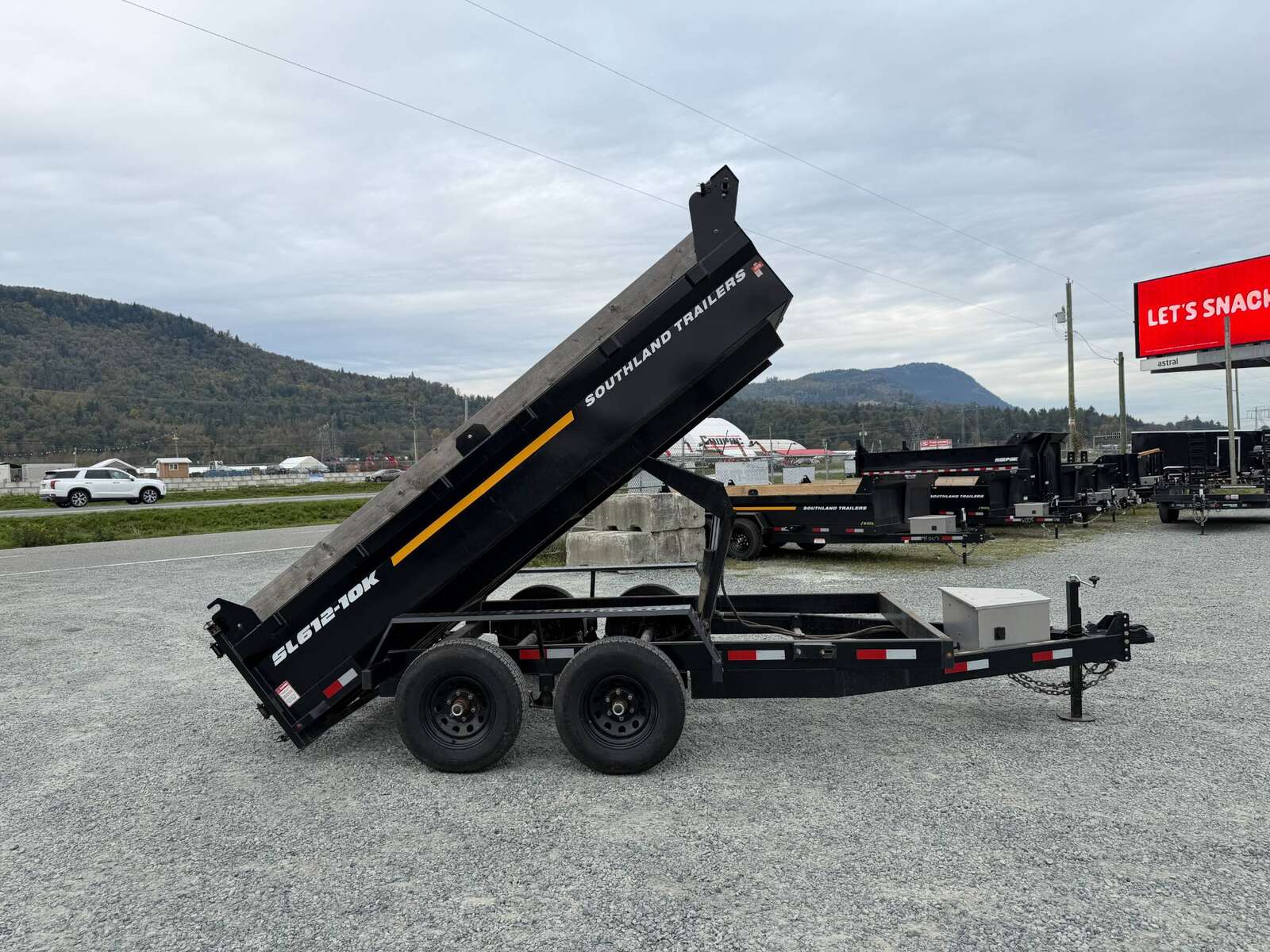 Photo of Pre Owned Used 2023 Southland 6X12 Dump Trailer 11,400LB GVW with Tarp and Ramps