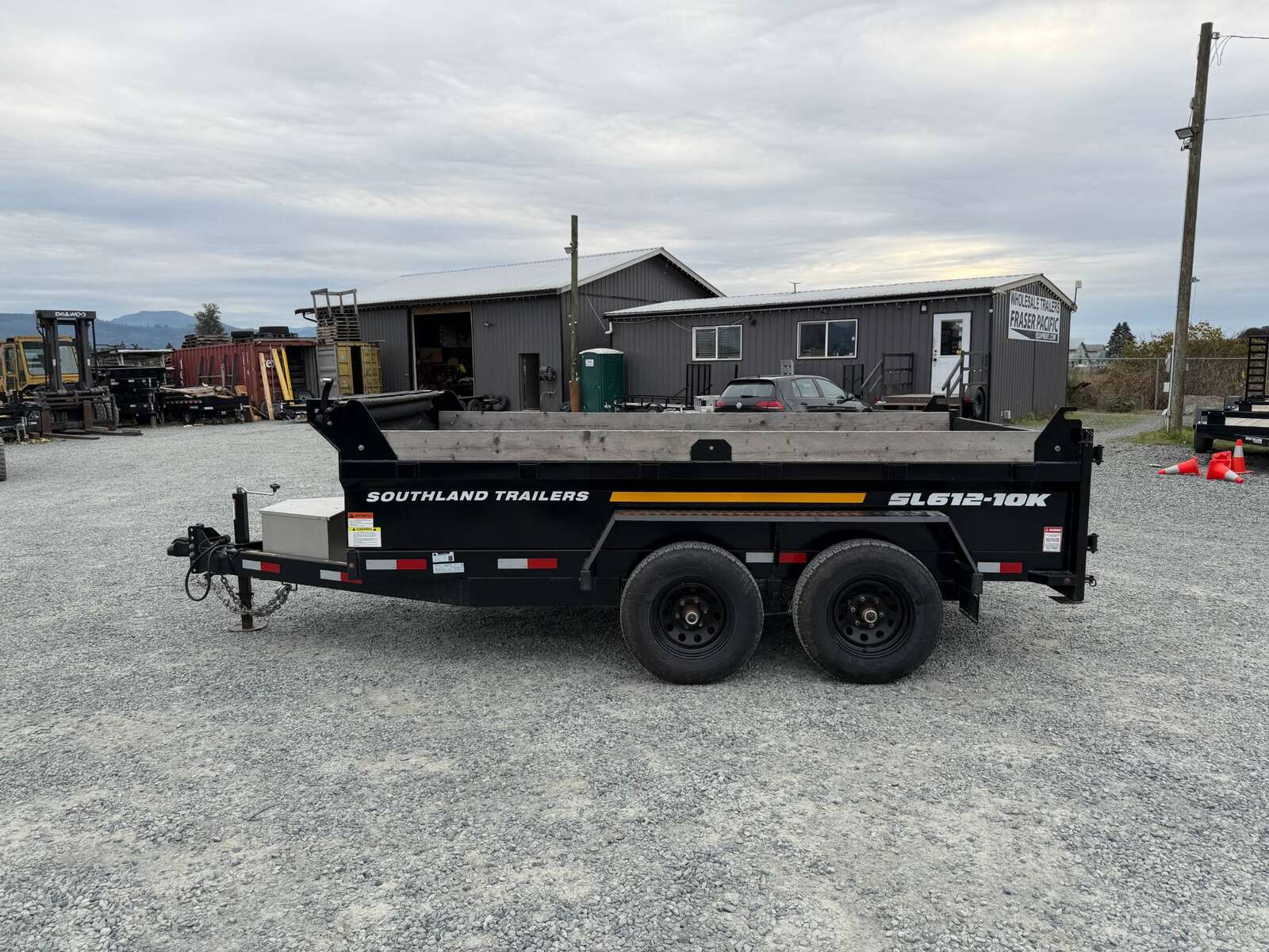 Photo of Pre Owned Used 2023 Southland 6X12 Dump Trailer 11,400LB GVW with Tarp and Ramps