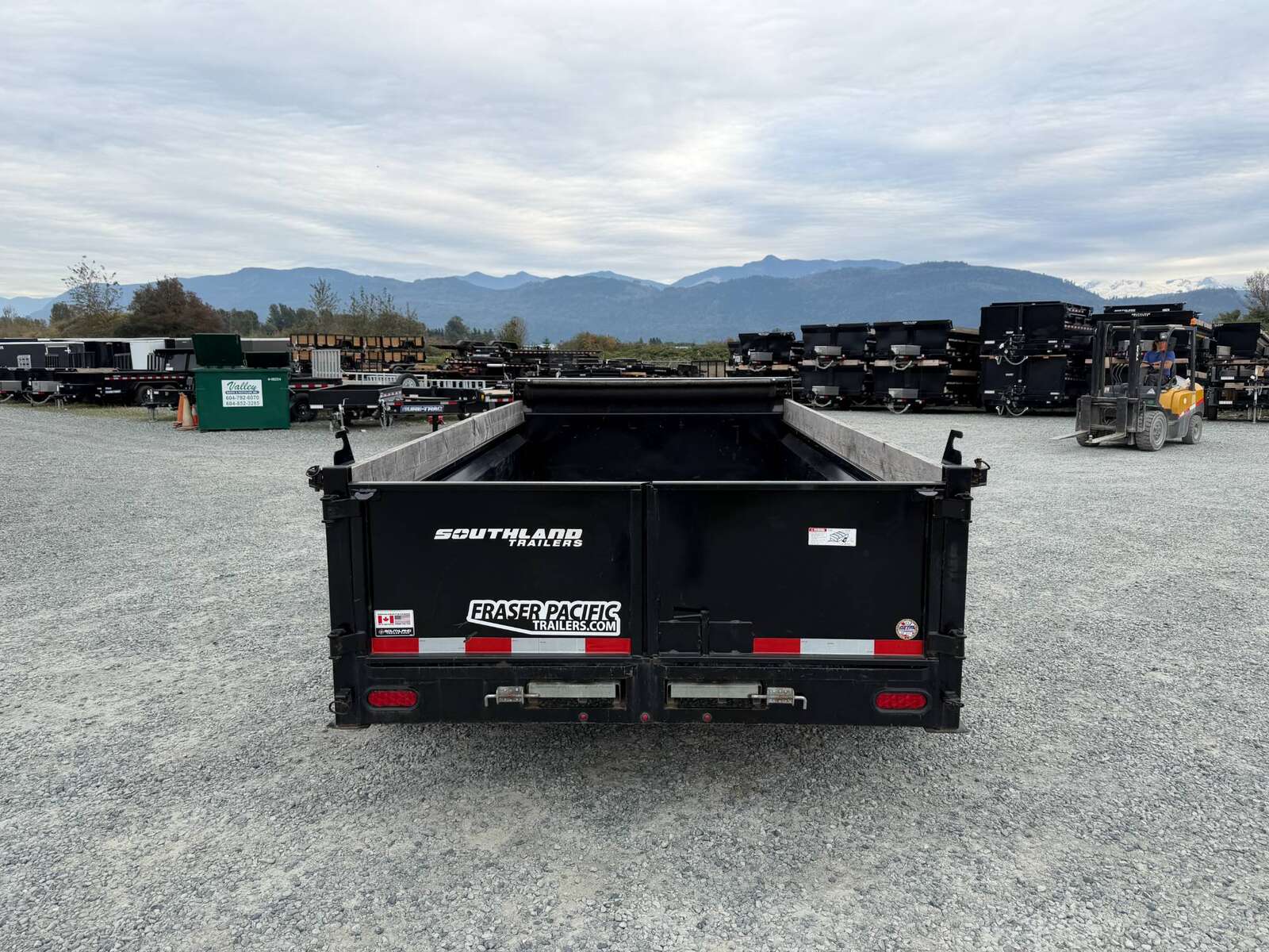 Photo of Pre Owned Used 2023 Southland 6X12 Dump Trailer 11,400LB GVW with Tarp and Ramps