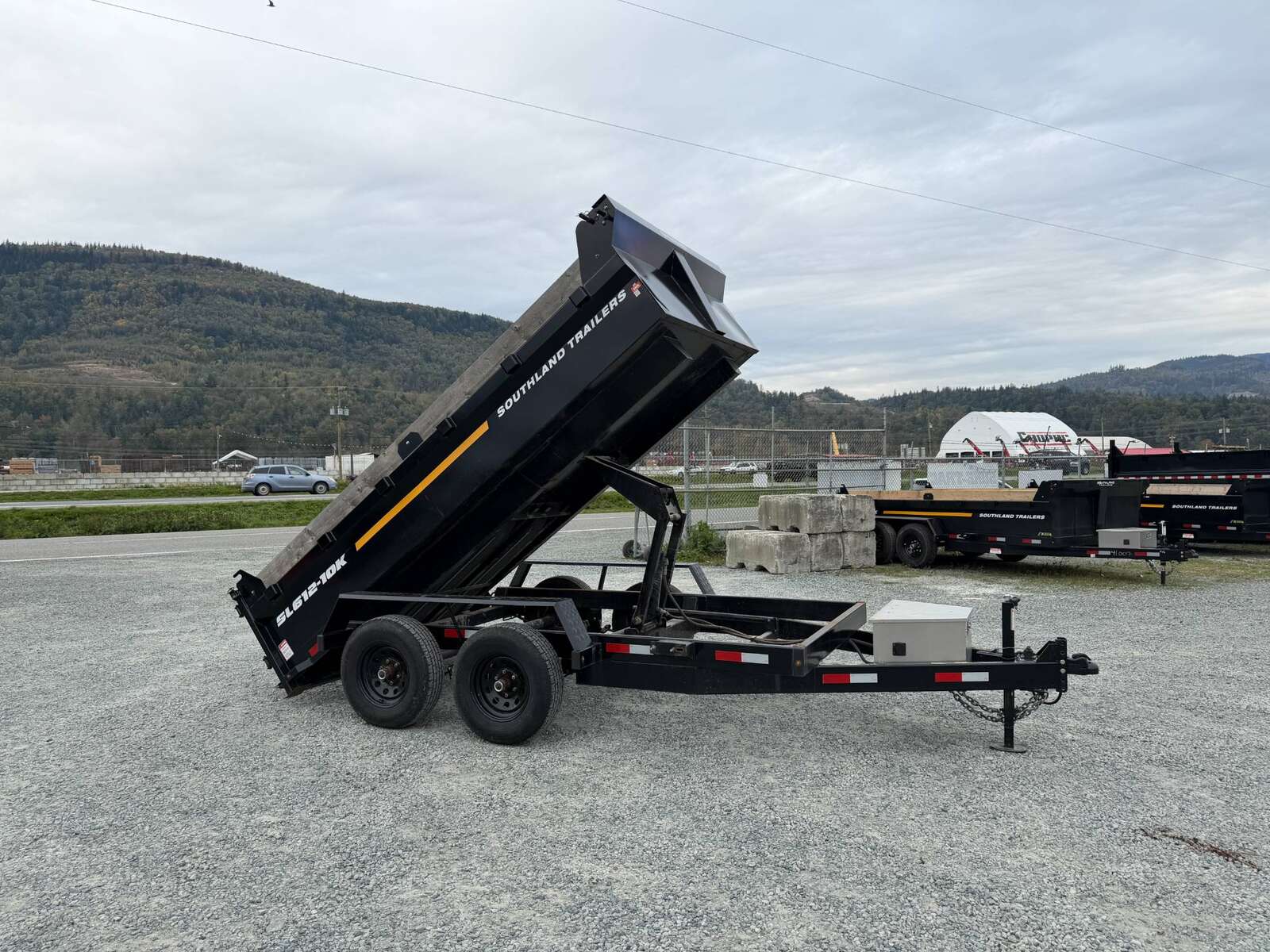 Photo of Pre Owned Used 2023 Southland 6X12 Dump Trailer 11,400LB GVW with Tarp and Ramps