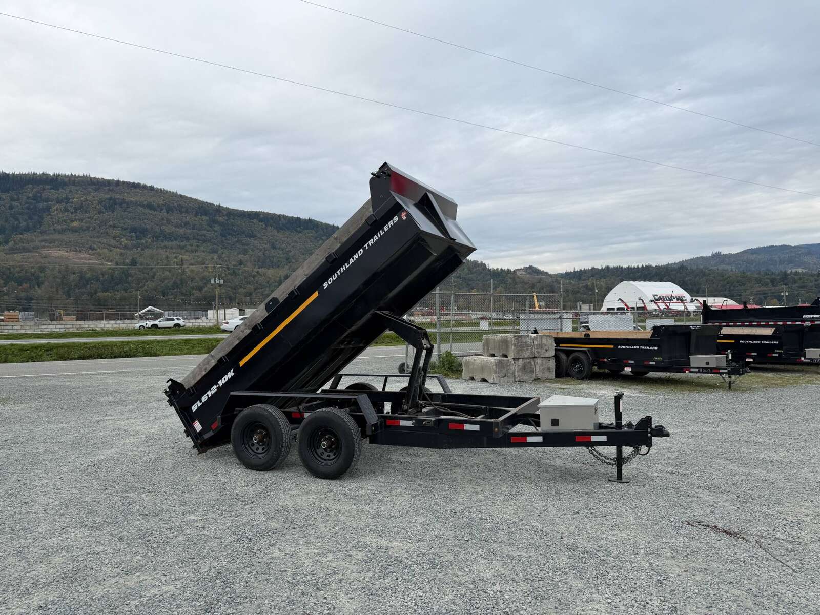 Photo of Pre Owned Used 2023 Southland 6X12 Dump Trailer 11,400LB GVW with Tarp and Ramps