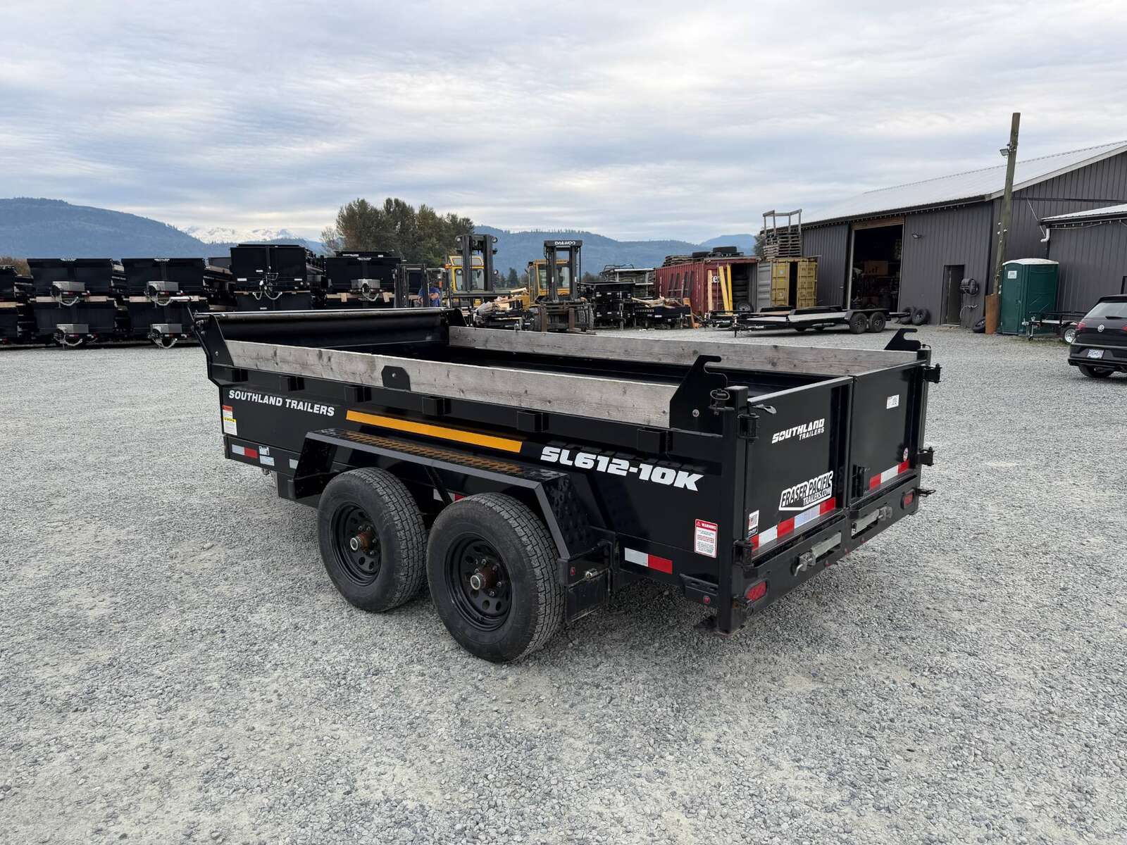 Photo of Pre Owned Used 2023 Southland 6X12 Dump Trailer 11,400LB GVW with Tarp and Ramps
