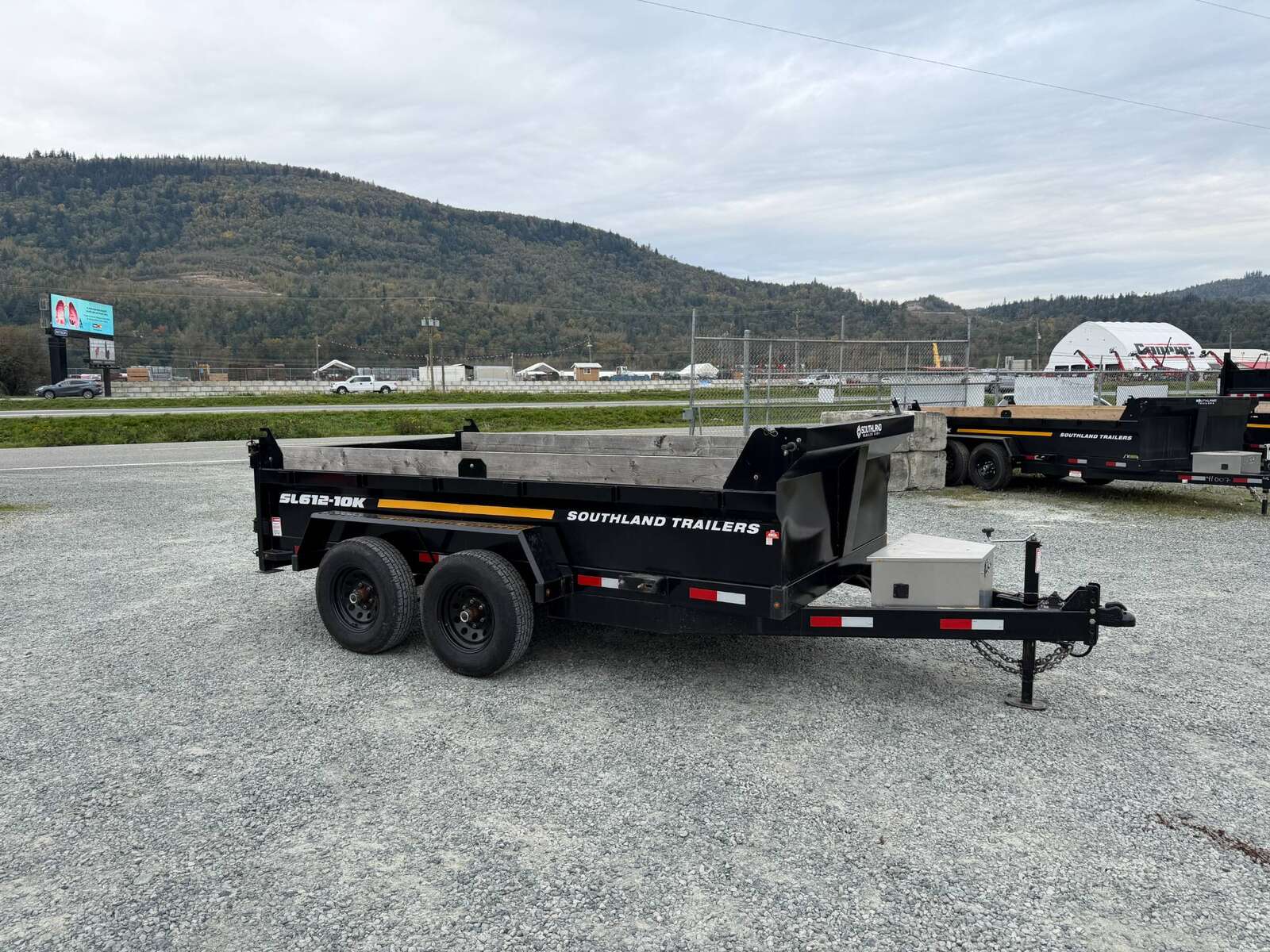 Photo of Pre Owned Used 2023 Southland 6X12 Dump Trailer 11,400LB GVW with Tarp and Ramps
