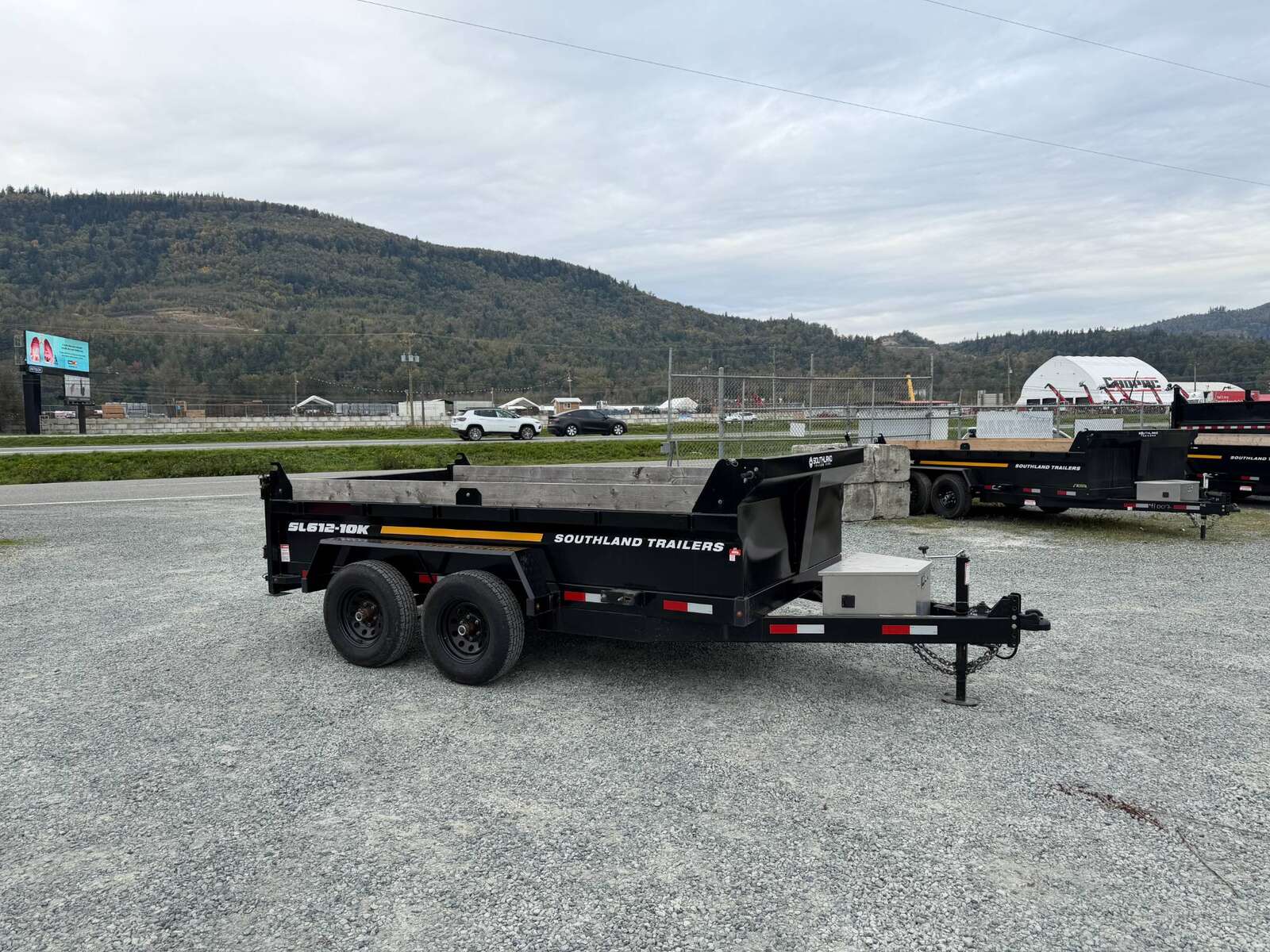 Photo of Pre Owned Used 2023 Southland 6X12 Dump Trailer 11,400LB GVW with Tarp and Ramps