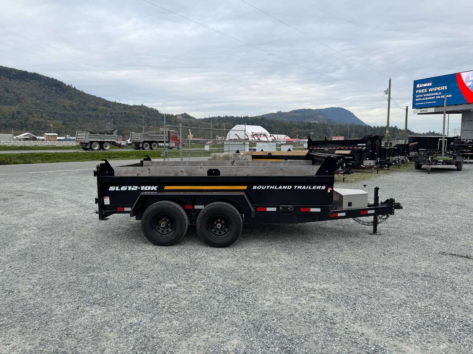 Photo of Pre Owned Used 2023 Southland 6X12 Dump Trailer 11,400LB GVW with Tarp and Ramps