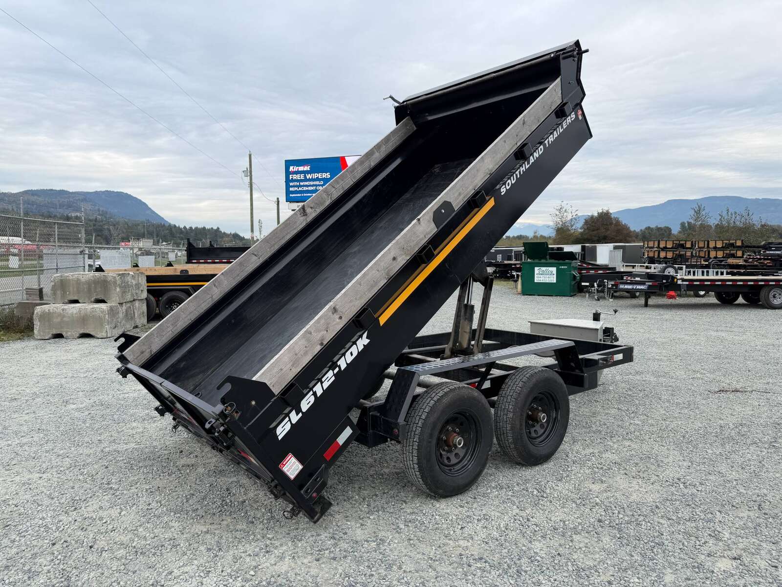 Photo of Pre Owned Used 2023 Southland 6X12 Dump Trailer 11,400LB GVW with Tarp and Ramps