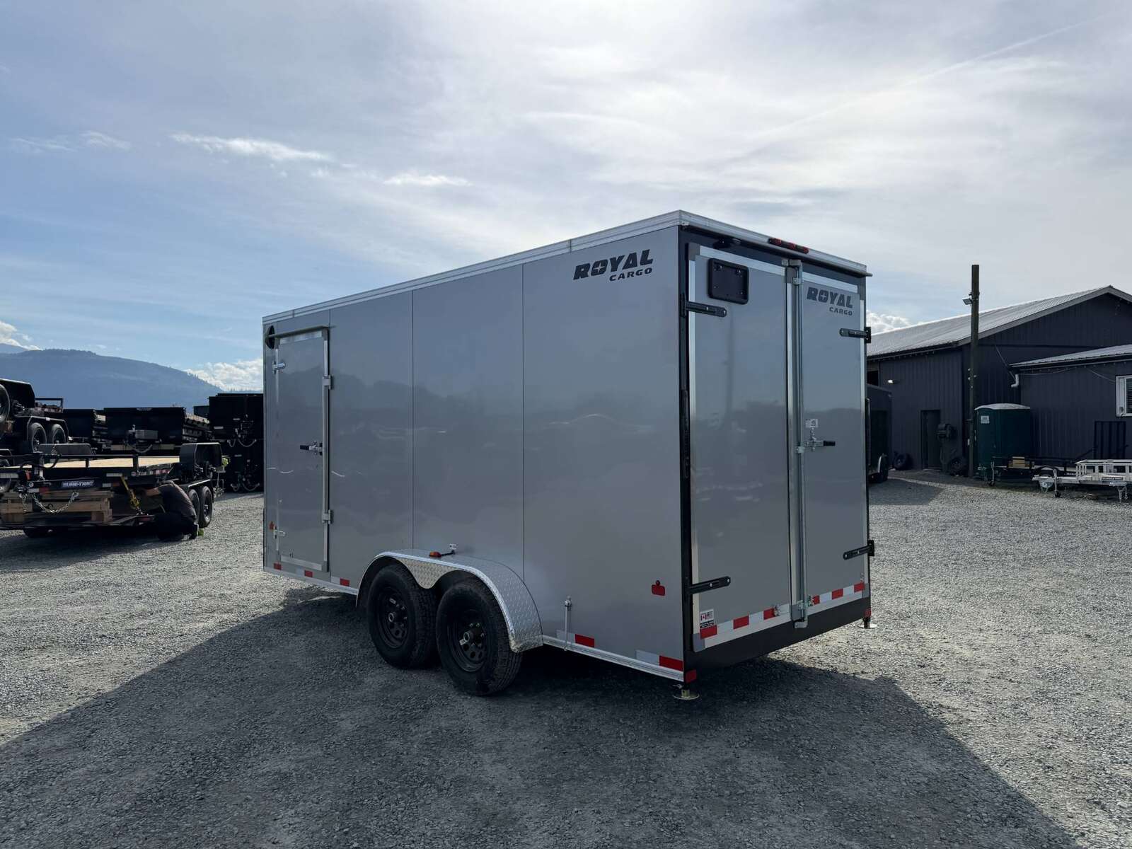Photo of 2026 Royal 7x16 Enclosed Cargo Trailer V Nose Barn Door Silver HD 11,400lb GVW Extra Height