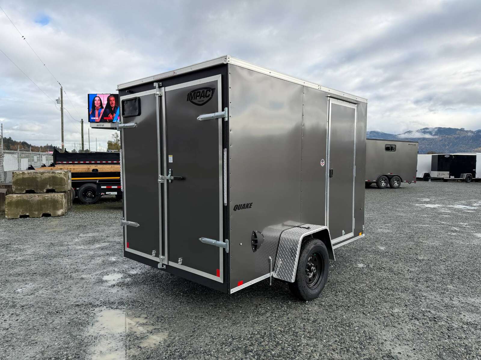 Photo of 2026 Impact Quake 6x10 V Nose Cargo / Enclosed Trailer Charcoal Grey Barn Doors Extra Height 2990lb GVW
