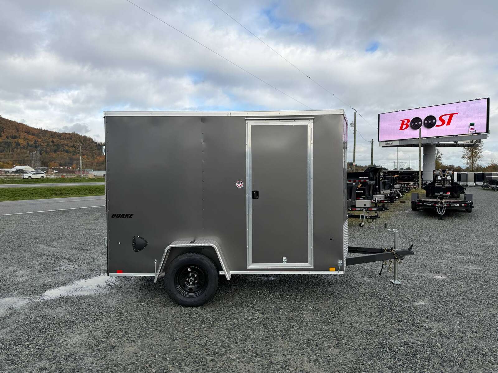 Photo of 2026 Impact Quake 6x10 V Nose Cargo / Enclosed Trailer Charcoal Grey Barn Doors Extra Height 2990lb GVW