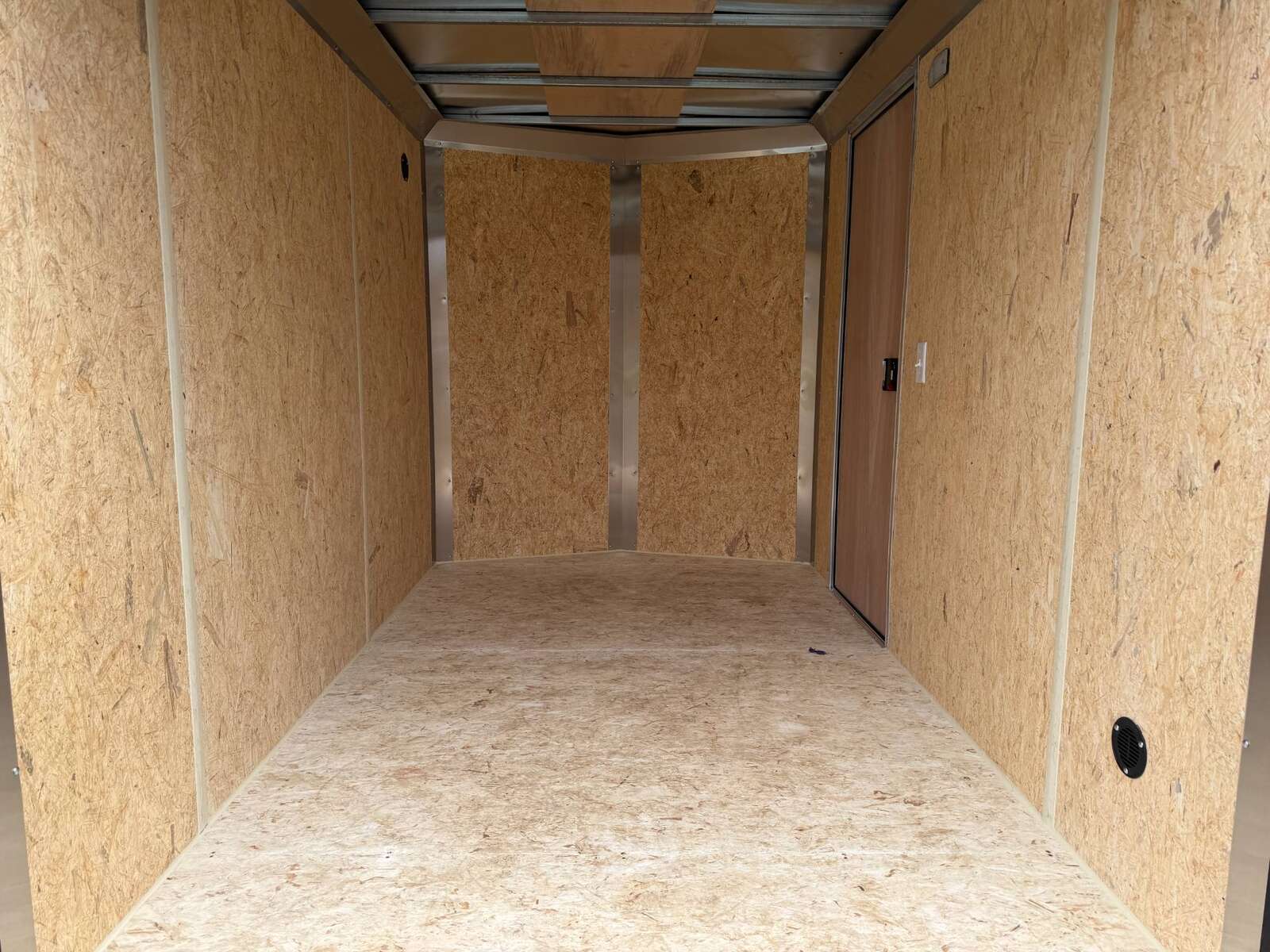 Photo of 2026 Impact Quake 6x10 V Nose Cargo / Enclosed Trailer Charcoal Grey Barn Doors Extra Height 2990lb GVW